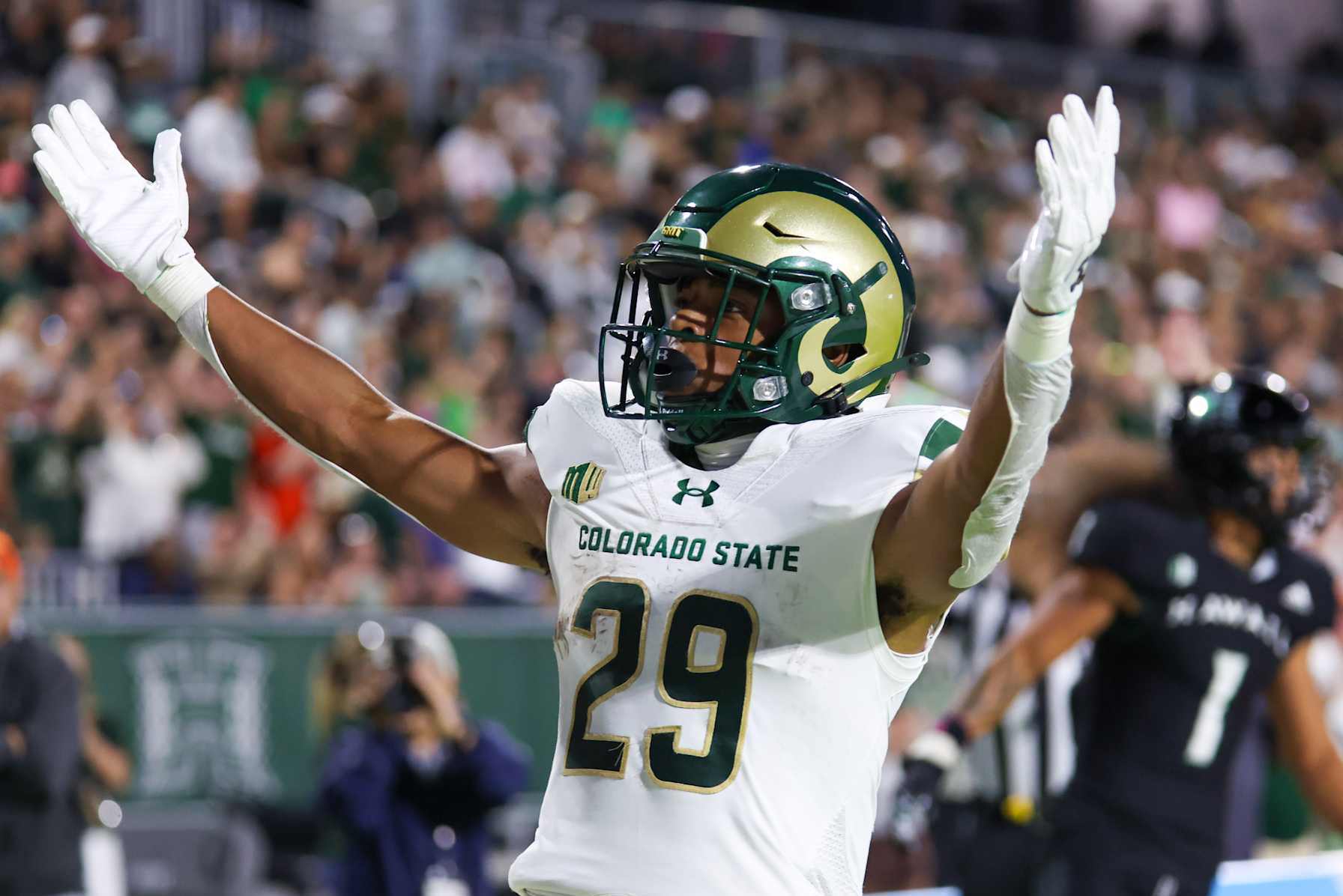 HONOLULU, HAWAII - NOVEMBER 25: Justin Marshall #29 of the Colorado State Rams gestures to the Colorado State fans after scoring a touchdown during the first half of their game against the Hawaii Rainbow Warriors at Clarence T.C. Ching Athletics Complex on November 25, 2023 in Honolulu, Hawaii. (Photo by Darryl Oumi/Getty Images)