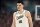 GLENDALE, ARIZONA - APRIL 06: Zach Edey #15 of the Purdue Boilermakers walks across the court in the first half against the North Carolina State Wolfpack in the NCAA Men's Basketball Tournament Final Four semifinal game at State Farm Stadium on April 06, 2024 in Glendale, Arizona. (Photo by Christian Petersen/Getty Images)