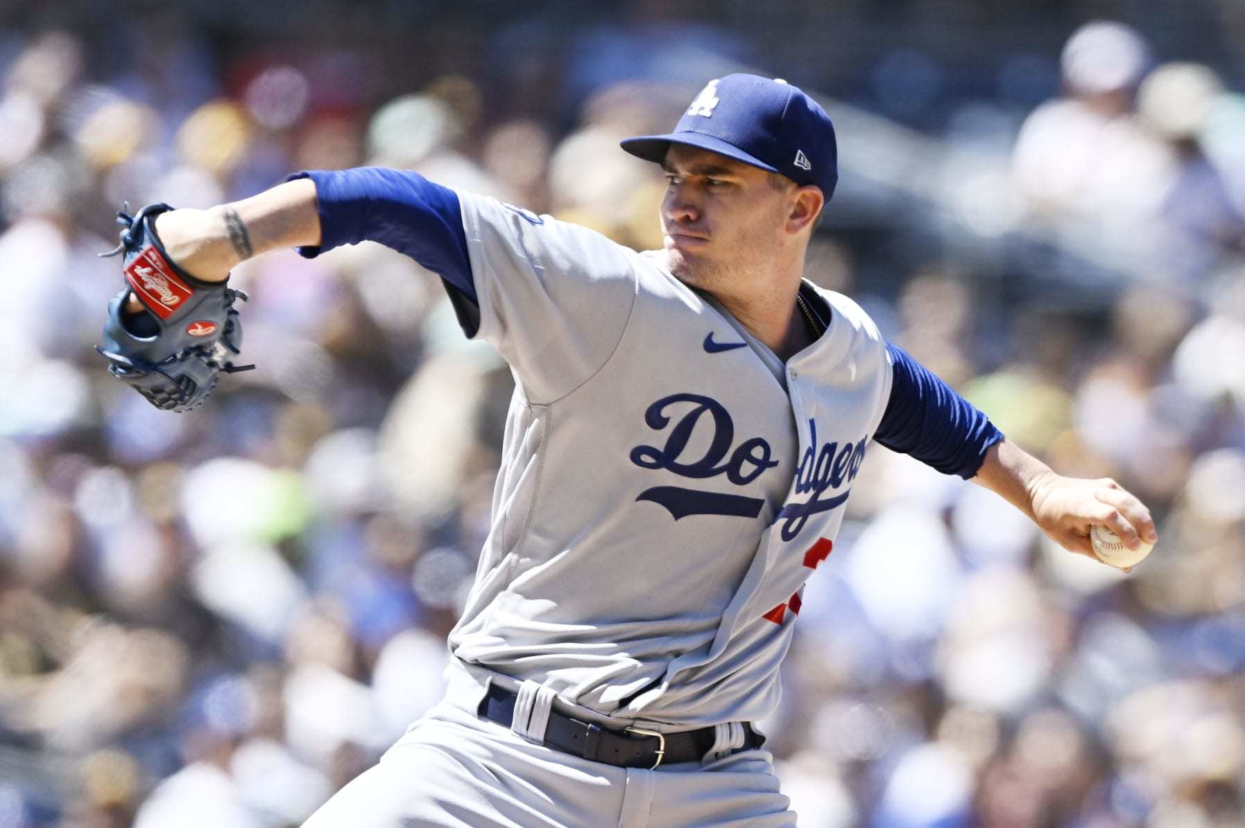 SAN DIEGO, CA - SEPTEMBER 11: Andrew Heaney #28 of the Los Angeles Dodgers pitches during the first inning of a baseball game against the San Diego Padres September 11, 2022 at Petco Park in San Diego, California. (Photo by Denis Poroy/Getty Images)