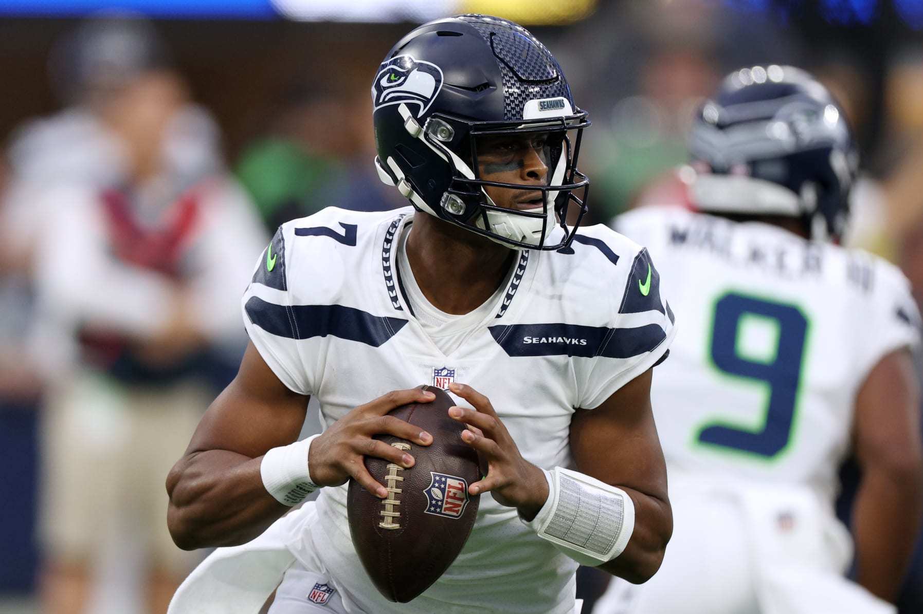 INGLEWOOD, CALIFORNIA - DECEMBER 04: Geno Smith #7 of the Seattle Seahawks looks to pass against the Los Angeles Rams during the first half at SoFi Stadium on December 04, 2022 in Inglewood, California. (Photo by Harry How/Getty Images)
