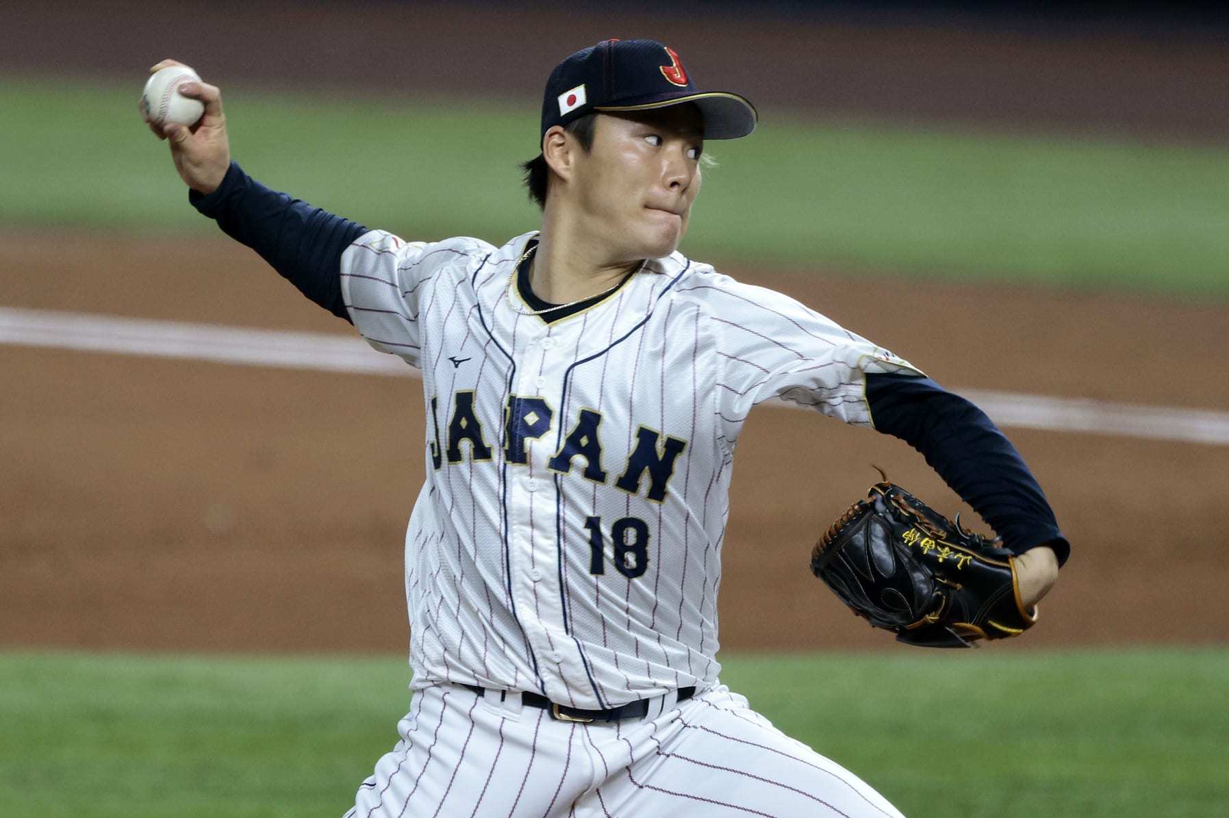 MIAMI, FL - MARCH 20: Yoshinobu Yamamoto #18 of Team Japan pitches during the 2023 World Baseball Classic Semifinal game against Team Mexico at loanDepot Park on Monday, March 20, 2023 in Miami, Florida. (Photo by Christopher Pasatieri/Getty Images)