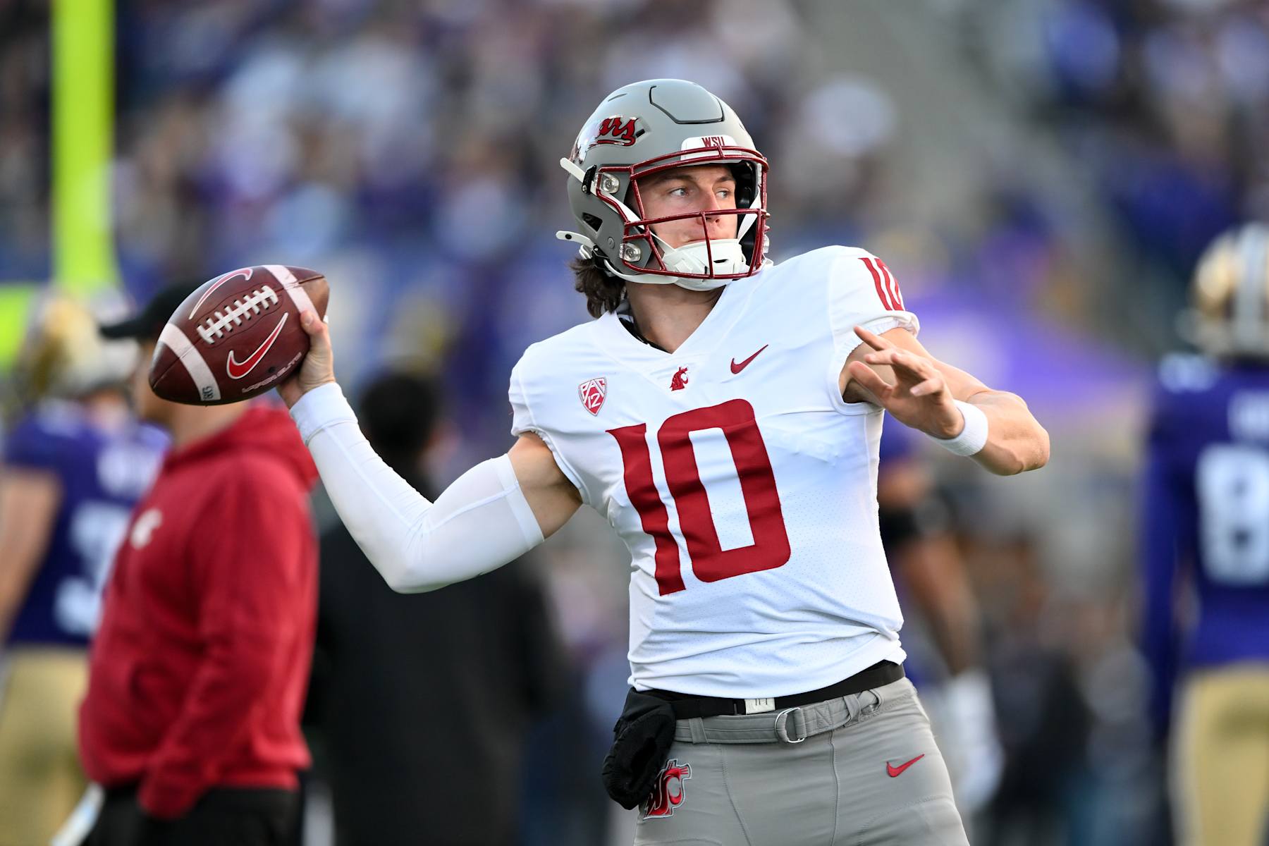 SEATTLE, WASHINGTON - NOVEMBER 25: John Mateer #10 of the Washington State Cougars warms up before the game against the Washington Huskies at Husky Stadium on November 25, 2023 in Seattle, Washington. (Photo by Alika Jenner/Getty Images)