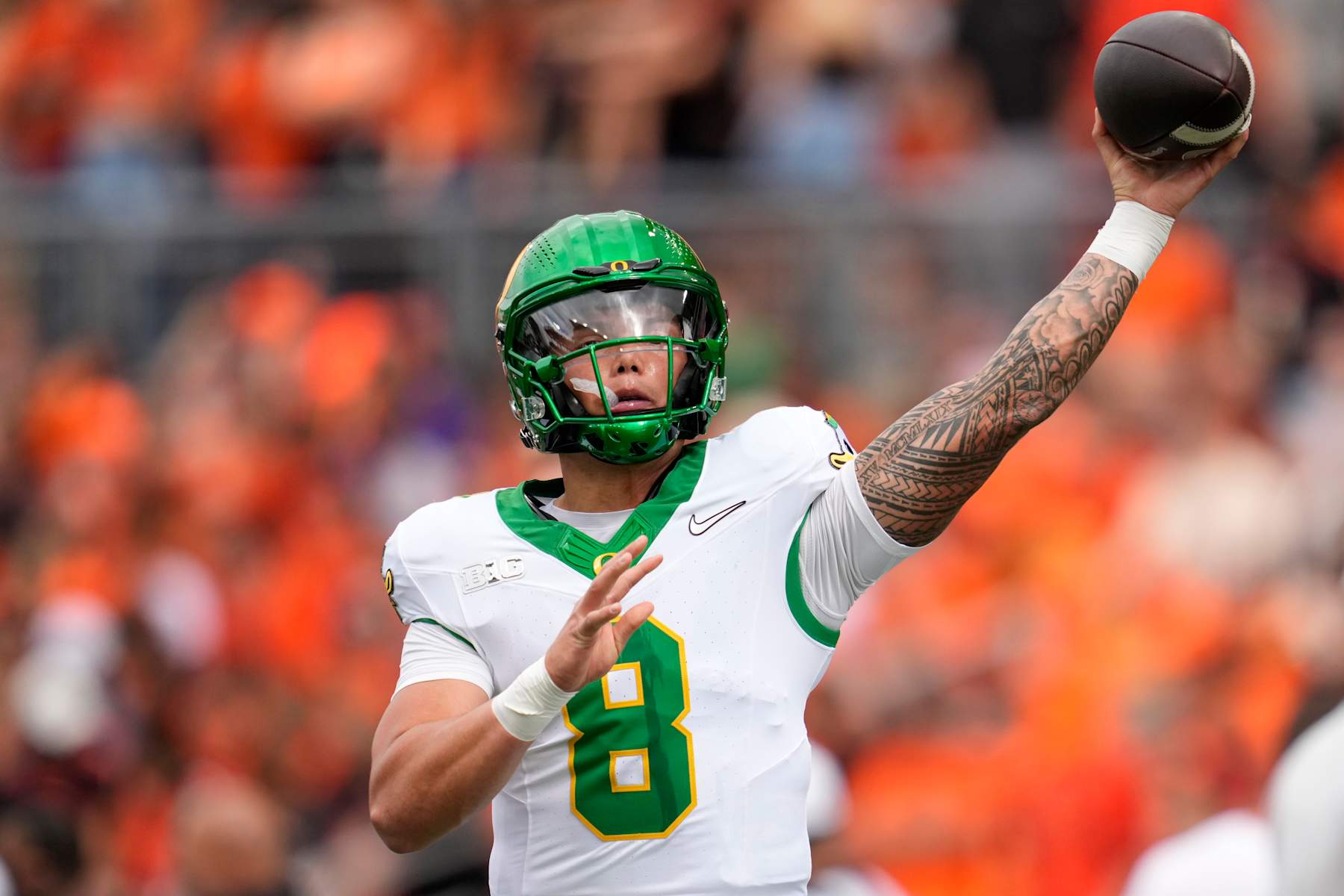 CORVALLIS, OREGON - SEPTEMBER 14: Dillon Gabriel #8 of the Oregon Ducks warms up before the game against the Oregon State Beavers at Reser Stadium on September 14, 2024 in Corvallis, Oregon.  (Photo by Soobum Im/Getty Images)