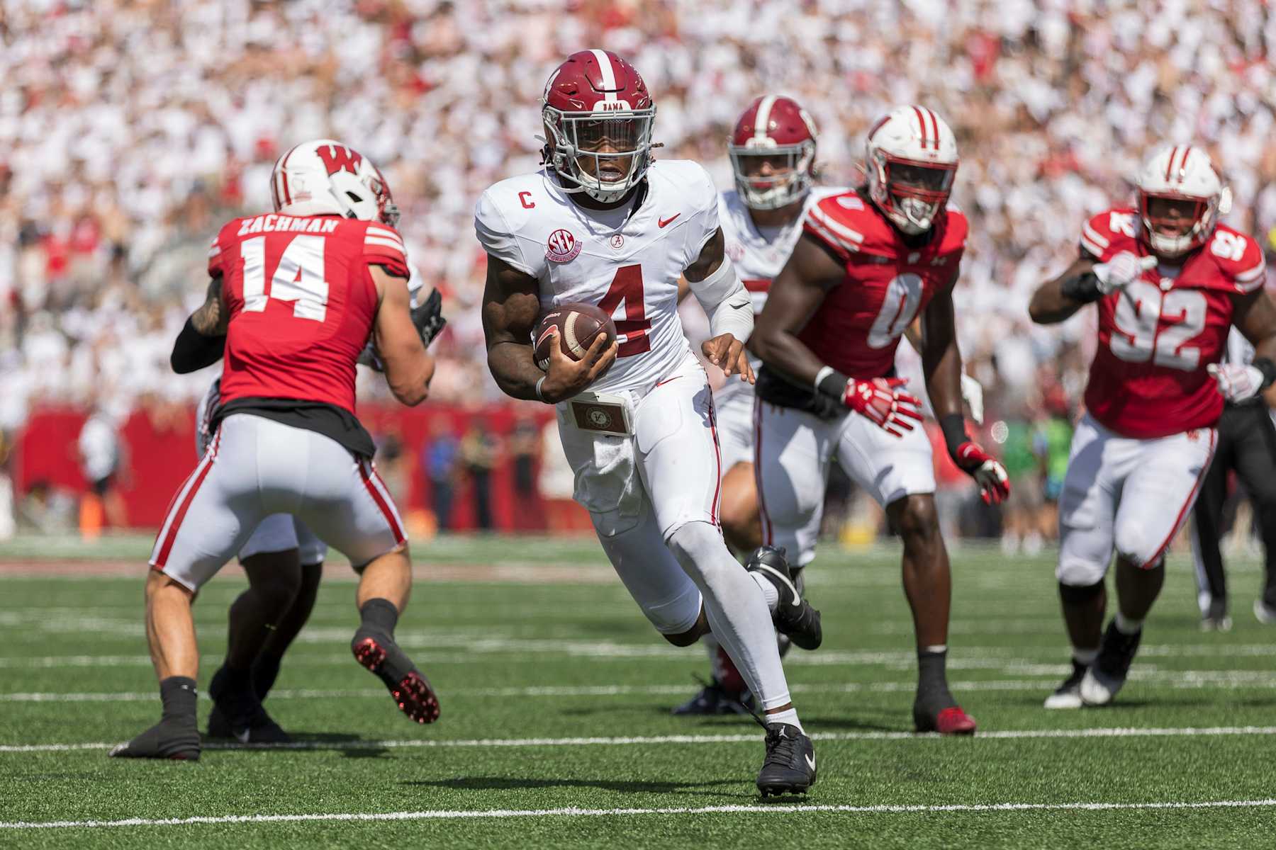 MADISON, WI - SEPTEMBER 14: Alabama Crimson Tide quarterback Jalen Milroe (4) rushes for a touchdown durning a college football game between the Alabama Crimson Tide and the Wisconsin Badgers on September 14th, 2024 at Barry Alvarez field inside Camp Randall Stadium in Madison, WI. (Photo by Dan Sanger/Icon Sportswire via Getty Images)