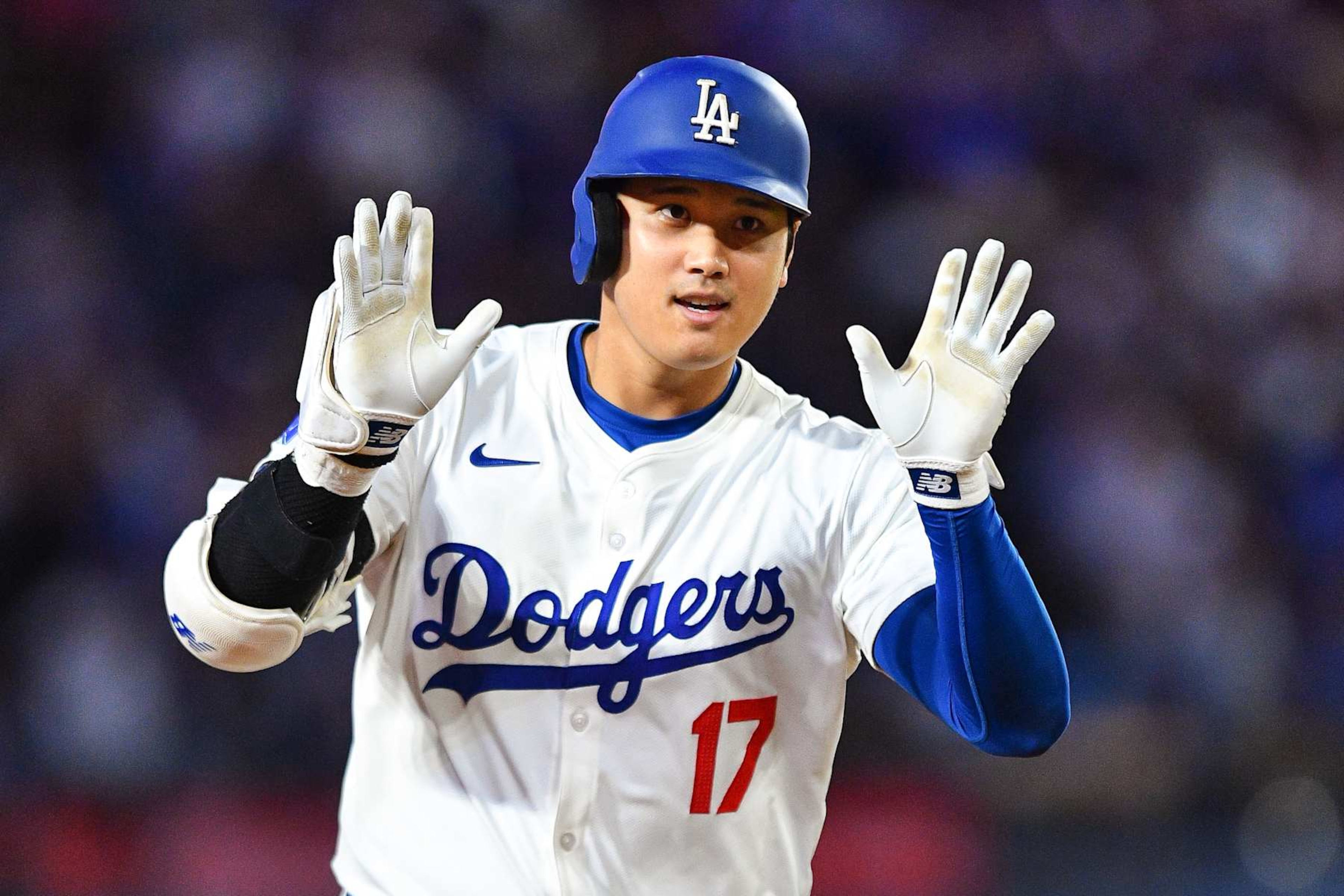 LOS ANGELES, CA - SEPTEMBER 20: Los Angeles Dodgers designated hitter Shohei Ohtani (17) rounds the bases after he hit his 52nd home run of the year during the MLB game between the Colorado Rockies and the Los Angeles Dodgers on September 20, 2024 at Dodger Stadium in Los Angeles, CA. (Photo by Brian Rothmuller/Icon Sportswire via Getty Images) LOS ANGELES, CA - SEPTEMBER 20: Los Angeles Dodgers designated hitter Shohei Ohtani (17) rounds the bases after he hit his 52nd home run of the year during the MLB game between the Colorado Rockies and the Los Angeles Dodgers on September 20, 2024 at Dodger Stadium in Los Angeles, CA. (Photo by Brian Rothmuller/Icon Sportswire via Getty Images)