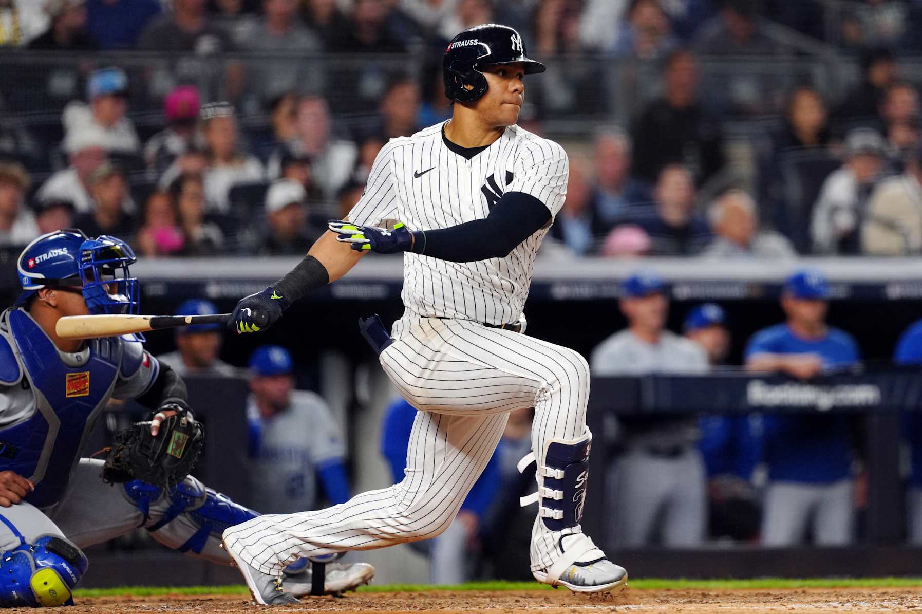 NEW YORK, NY - OCTOBER 05: Juan Soto #22 of he New York Yankees singles in the sixth inning during Game 1 of the Division Series presented by Booking.com between the Kansas City Royals and the New York Yankees at Yankee Stadium on Saturday, October 5, 2024 in New York, New York. (Photo by Mary DeCicco/MLB Photos via Getty Images)
