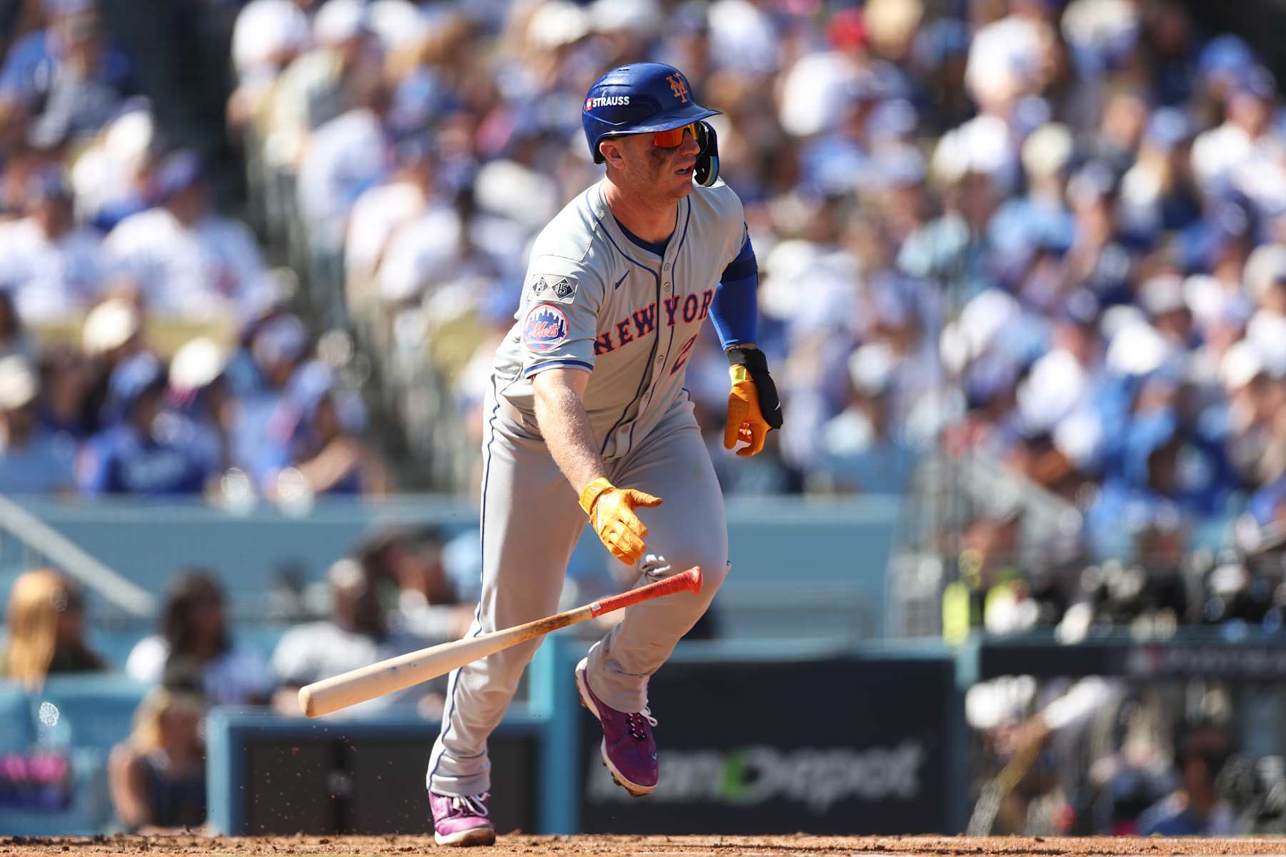 LOS ANGELES, CALIFORNIA - OCTOBER 14: Pete Alonso #20 of the New York Mets runs to first base on a single as he plays against the Los Angeles Dodgers in the third inning during Game Two of the Championship Series at Dodger Stadium on October 14, 2024 in Los Angeles, California.  (Photo by Sean M. Haffey/Getty Images)