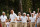 CHARLOTTE, NORTH CAROLINA - SEPTEMBER 24: Tom Kim of South Korea and the International Team celebrates his hole-winning putt to win the match 1 Up with teammate Si Woo Kim of South Korea against Patrick Cantlay and Xander Schauffele of the United States Team during Saturday afternoon four-ball matches on day three of the 2022 Presidents Cup at Quail Hollow Country Club on September 24, 2022 in Charlotte, North Carolina. (Photo by Jared C. Tilton/Getty Images)