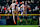 DENVER, COLORADO - SEPTEMBER 1: Gunnar Henderson #2 of the Baltimore Orioles jumps and celebrates with Cedric Mullins #31 after a win against the Colorado Rockies at Coors Field on September 1, 2024 in Denver, Colorado. (Photo by Dustin Bradford/Getty Images)