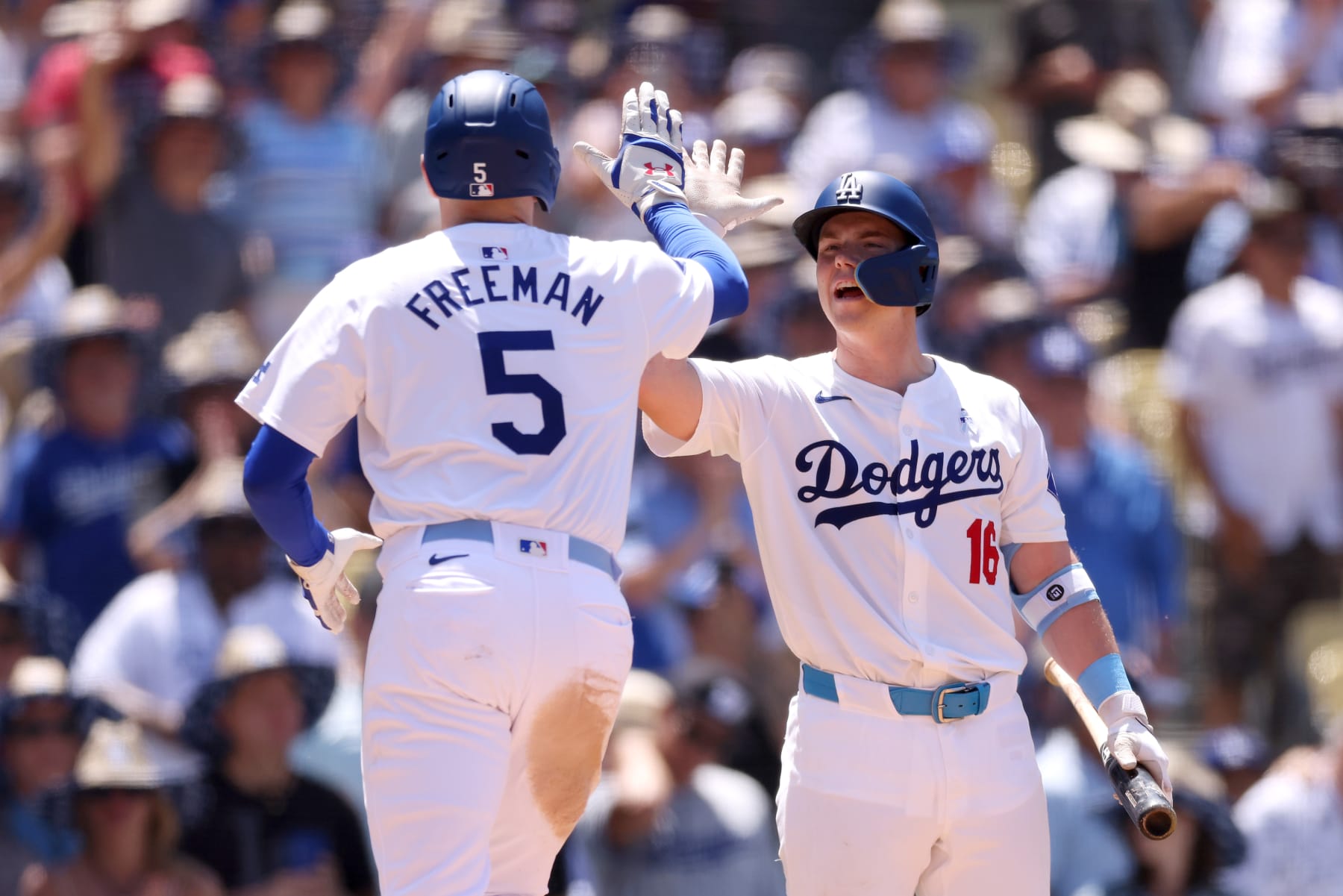 LOS ANGELES, CALIFORNIA - JUNE 16: Freddie Freeman #5 of the Los Angeles Dodgers celebrates his home run with teammate Will Smith #16 during the sixth inning against the Kansas City Royals at Dodger Stadium on June 16, 2024 in Los Angeles, California. (Photo by Katelyn Mulcahy/Getty Images)