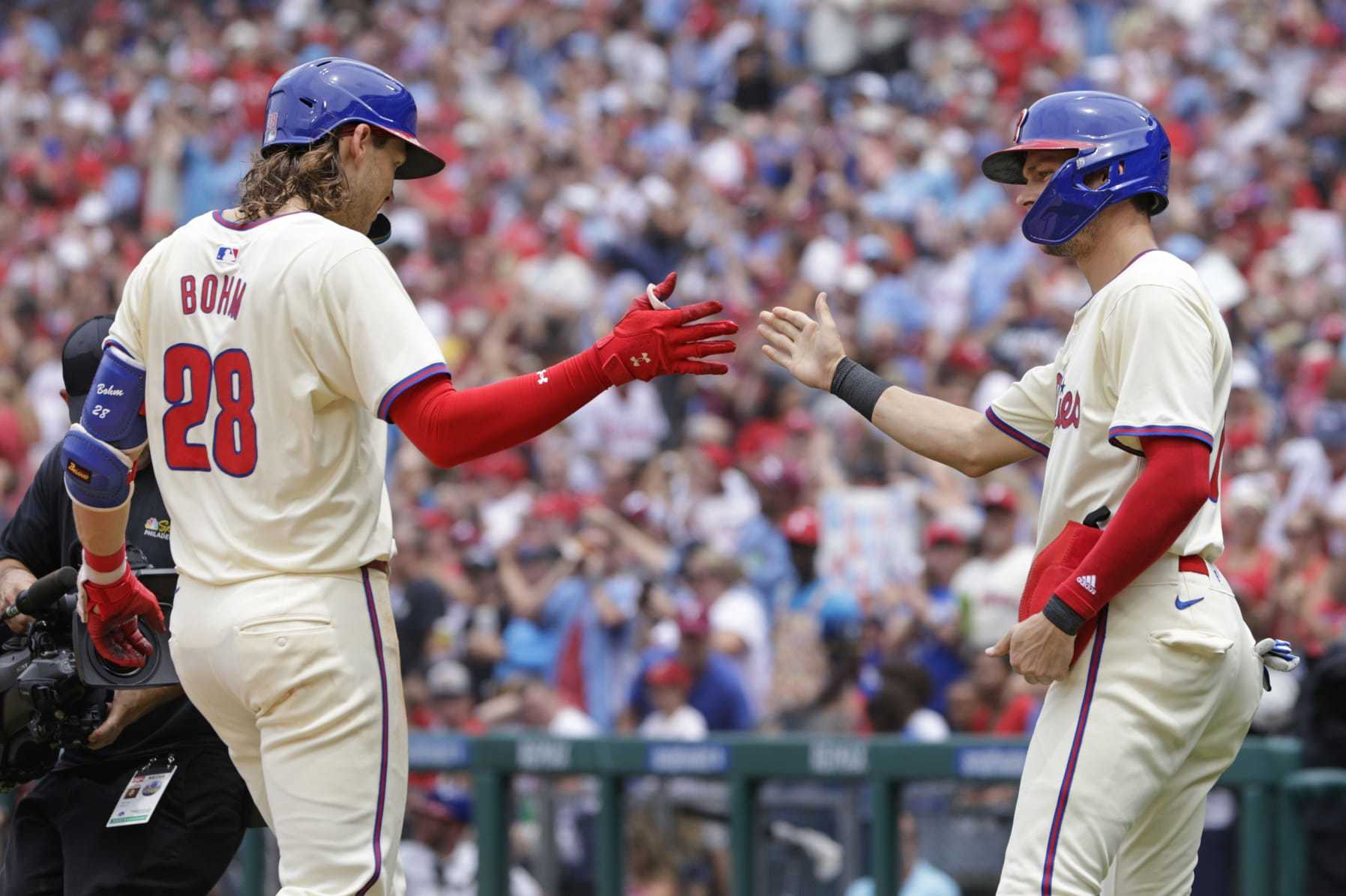 PHILADELPHIA, PENNSYLVANIA - JUNE 30: Alec Bohm #28 of the Philadelphia Phillies is congratulated by Trea Turner #7 of the Philadelphia Phillies after hitting a two-run home run during the first inning of a game at Citizens Bank Park on June 30, 2024 in Philadelphia, Pennsylvania. (Photo by Rich Schultz/Getty Images)