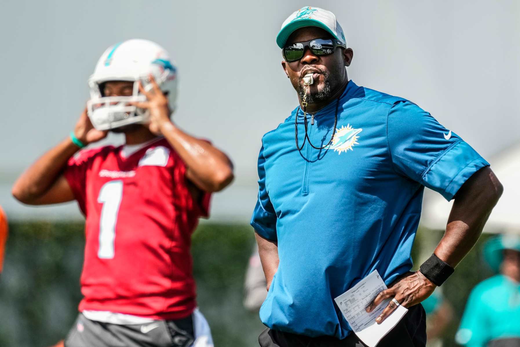 MIAMI GARDENS, FLORIDA - JULY 31: Head Coach Brian Flores of the Miami Dolphins giving instructions for practice drills during Training Camp at Baptist Health Training Complex on July 31, 2021 in Miami Gardens, Florida. (Photo by Mark Brown/Getty Images)