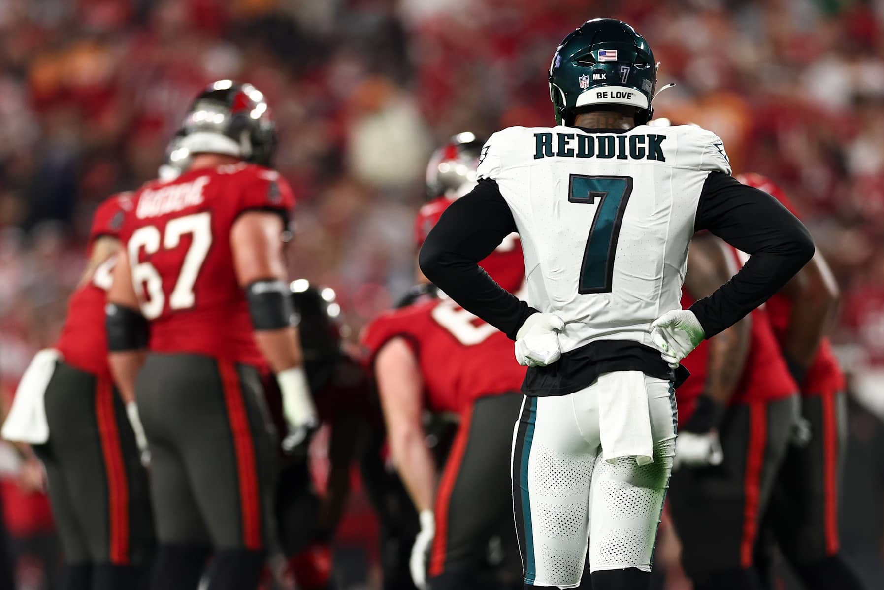 TAMPA, FL - JANUARY 15: Haason Reddick #7 of the Philadelphia Eagles looks on as the Tampa Bay Buccaneers offense huddles during an NFL wild-card playoff football game at Raymond James Stadium on January 15, 2024 in Tampa, Florida. (Photo by Kevin Sabitus/Getty Images)