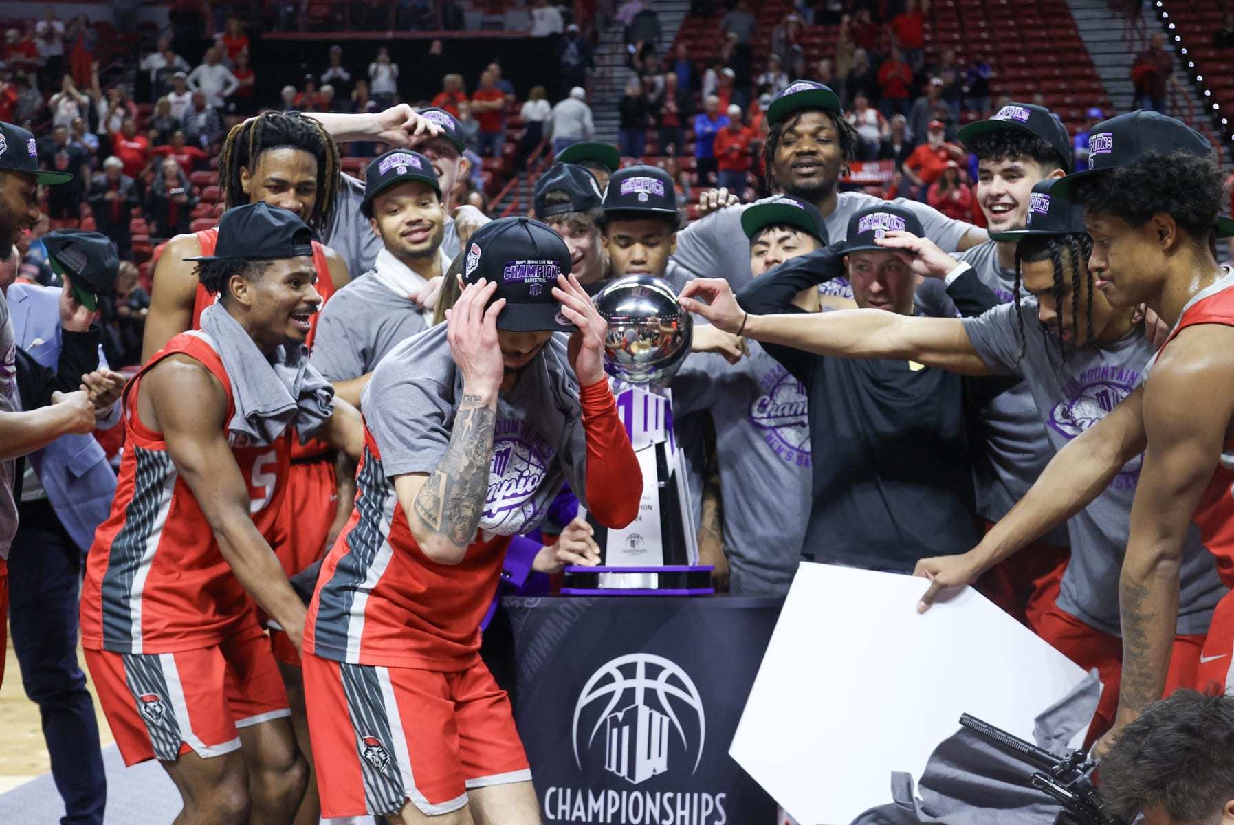 LAS VEGAS, NEVADA - MARCH 16: Jaelen House #10 of the New Mexico Lobos dances while celebrating with teammates after defeating the San Diego State Aztecs in the championship game of the Mountain West basketball tournament at the Thomas & Mack Center on March 16, 2024 in Las Vegas, Nevada. The Lobos won 68-61. (Photo by Ian Maule/Getty Images)