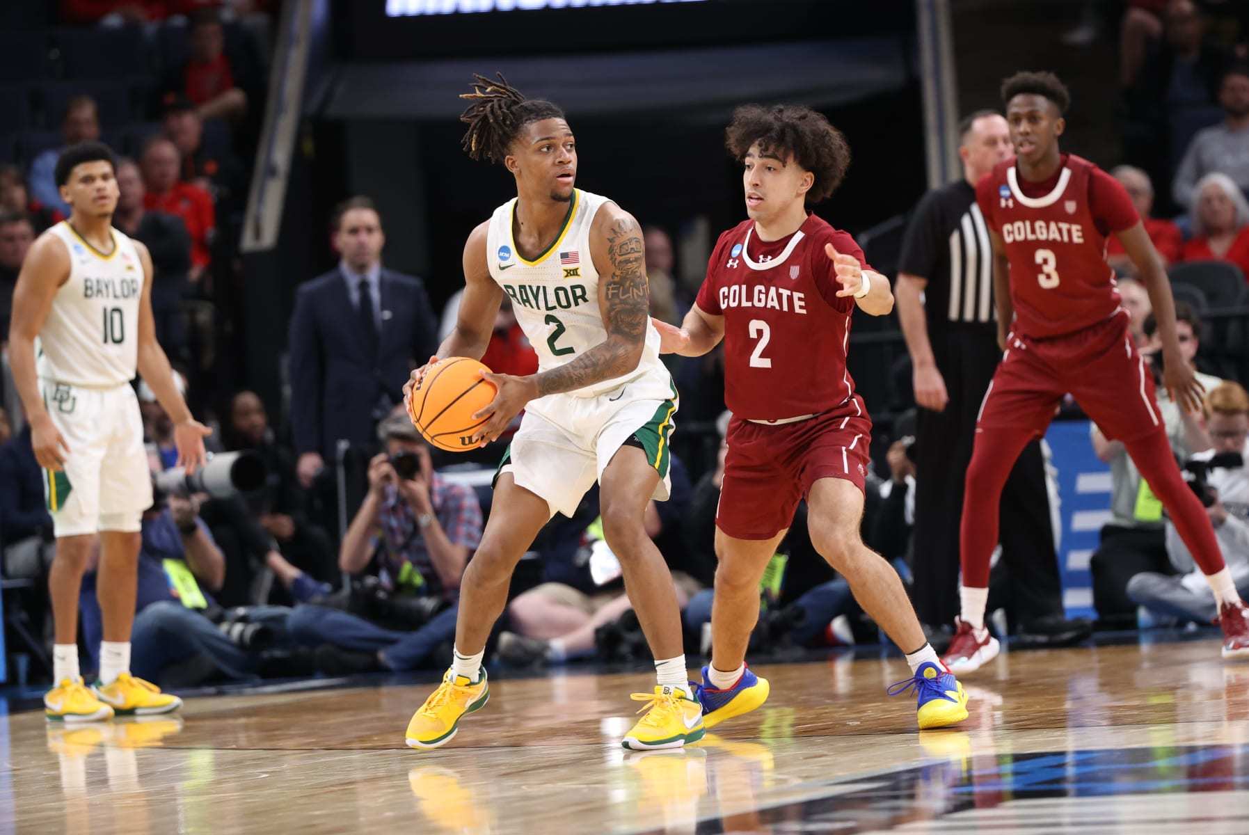 MEMPHIS, TENNESSEE - MARCH 22: Jayden Nunn #2 of the Baylor Bears is defended by Braeden Smith #2 of the Colgate Raiders during the first round of the 2024 NCAA Men's Basketball Tournament held at FedExForum on March 22, 2024 in Memphis, Tennessee. (Photo by Joe Murphy/NCAA Photos via Getty Images)