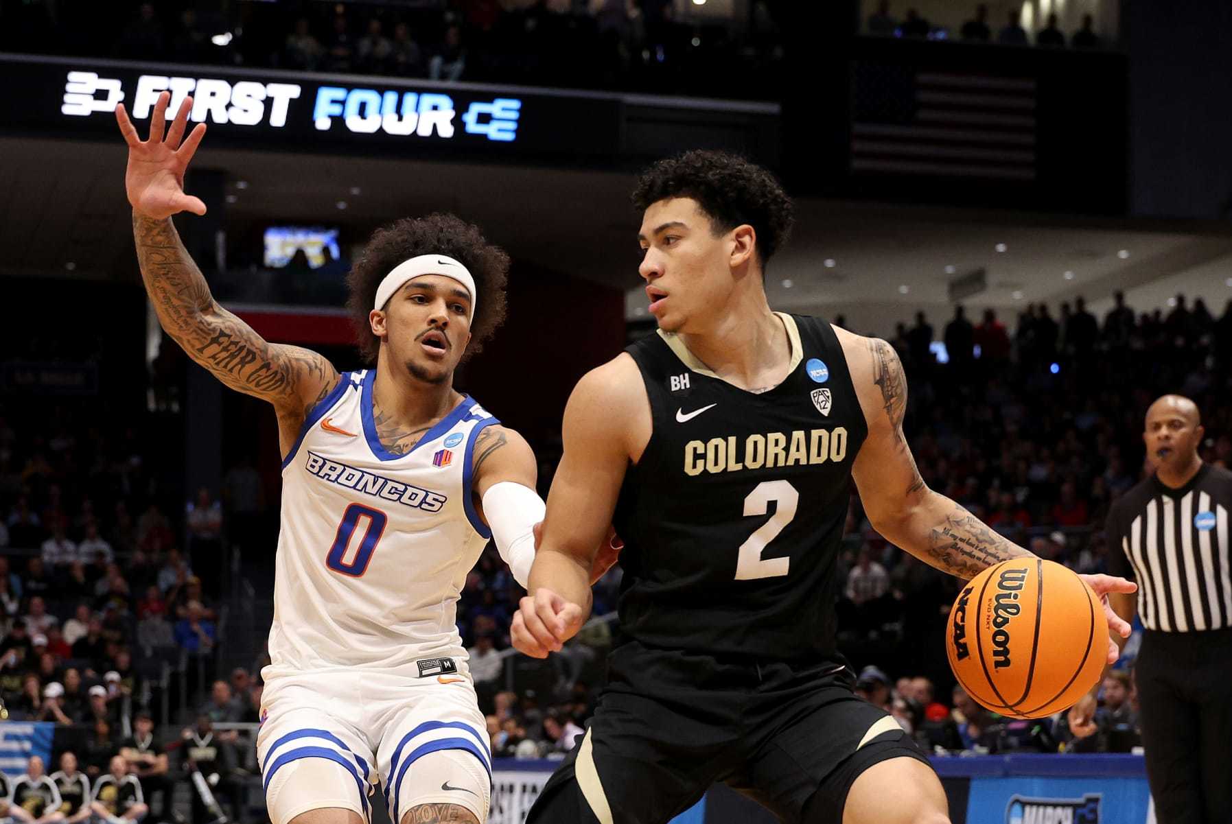 DAYTON, OHIO - MARCH 20: KJ Simpson #2 of the Colorado Buffaloes dribbles against Roddie Anderson III #0 of the Boise State Broncos prior to the First Four game of the NCAA Men's Basketball Tournament at University of Dayton Arena on March 20, 2024 in Dayton, Ohio. (Photo by Michael Hickey/Getty Images)