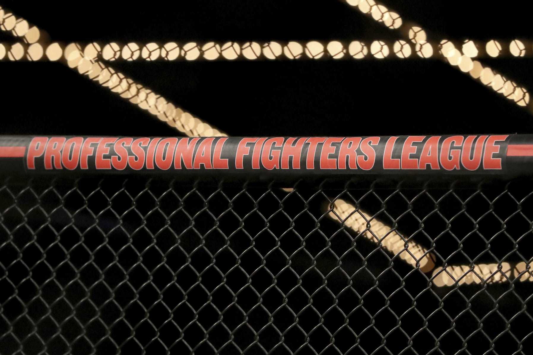 The Professional Fighters League logo is seen on the cage before a mixed martial arts bout at PFL 1, Thursday, June 7, 2018, at Madison Square Garden in New York. (AP Photo/Gregory Payan)
