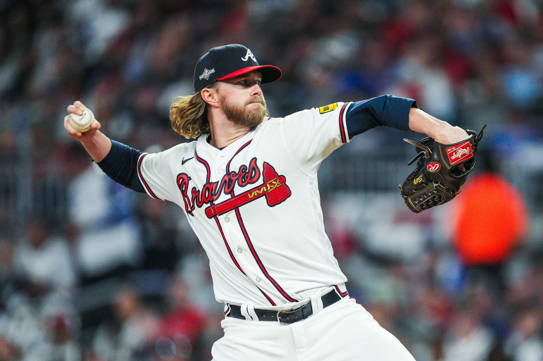 ATLANTA, GEORGIA - OCTOBER 9: Pierce Johnson #38 of the Atlanta Braves pitches against the Philadelphia Phillies during the seventh inning in Game Two of the Division Series at Truist Park on October 9, 2023 in Atlanta, Georgia. (Photo by Matthew Grimes Jr./Atlanta Braves/Getty Images)