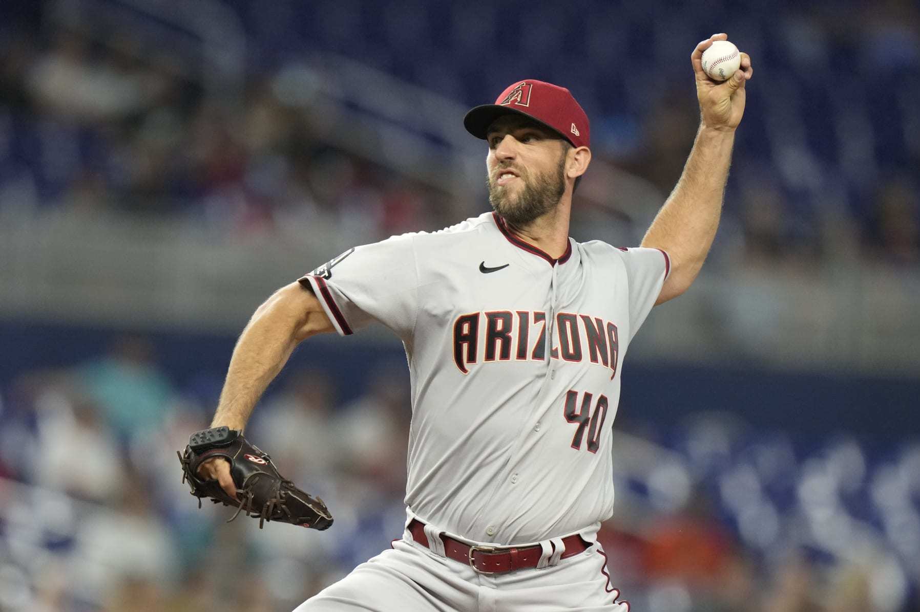 Arizona Diamondbacks starting pitcher Madison Bumgarner throws during the first inning of a baseball game against the Miami Marlins, Friday, April 14, 2023, in Miami. (AP Photo/Lynne Sladky)