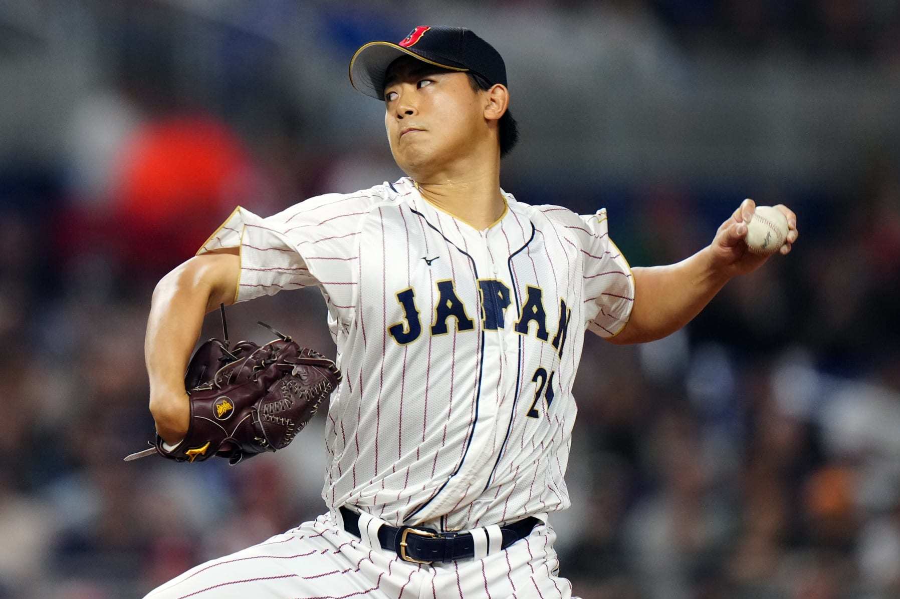 MIAMI, FL - MARCH 21: Shota Imanaga #21 of Team Japan pitches in the first inning during the 2023 World Baseball Classic Championship game between Team USA and Team Japan at loanDepot Park on Tuesday, March 21, 2023 in Miami, Florida. (Photo by Daniel Shirey/WBCI/MLB Photos via Getty Images)