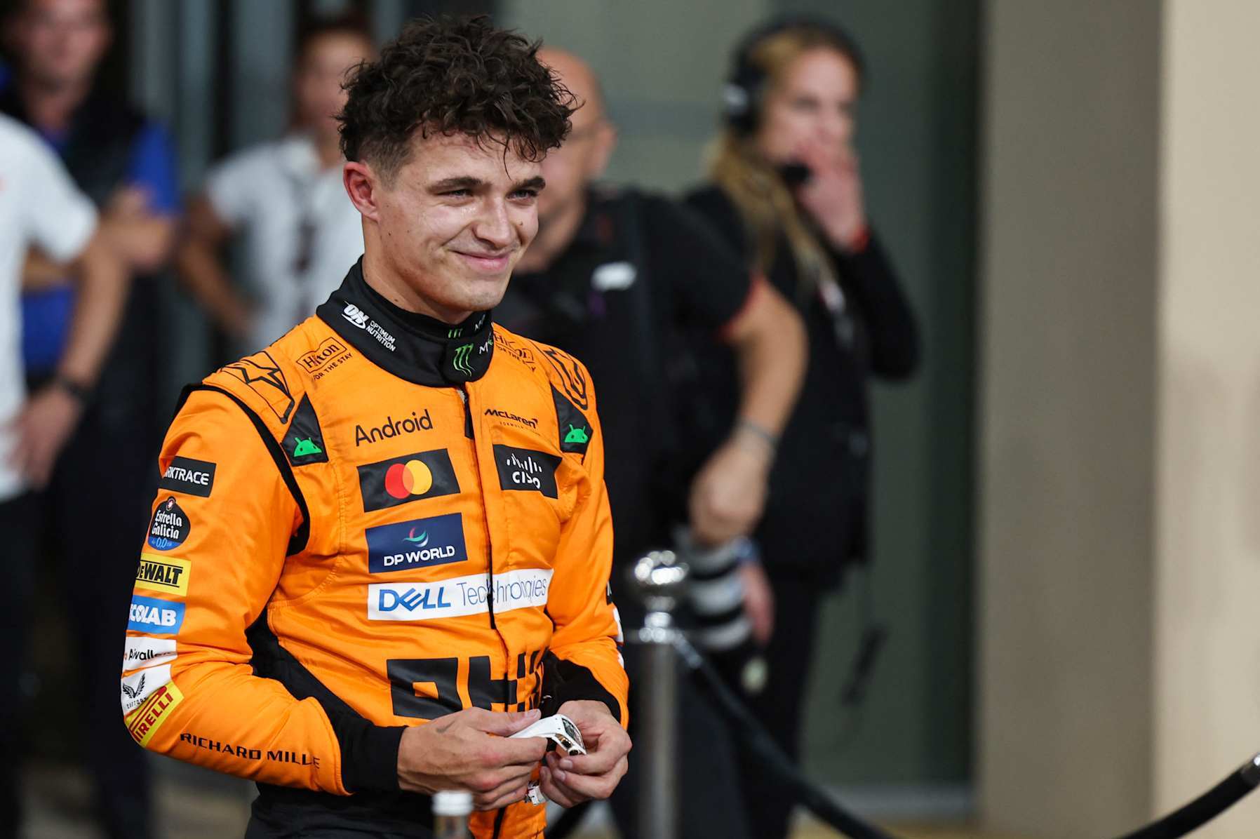 McLaren's British driver Lando Norris reacts after claiming pole position at the end of the qualifying session ahead of the Abu Dhabi Formula One Grand Prix at the Yas Marina Circuit in Abu Dhabi on December 7, 2024. (Photo by HAMAD I MOHAMMED / POOL / AFP) (Photo by HAMAD I MOHAMMED/POOL/AFP via Getty Images)