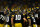 INDIANAPOLIS, IN - DECEMBER 02: Iowa Hawkeyes quarterback Deacon Hill (10) huddle the offense on the field during the Big 10 Championship game between the Michigan Wolverines and Iowa Hawkeyes on December 2, 2023, at Lucas Oil Stadium in Indianapolis, IN. (Photo by Zach Bolinger/Icon Sportswire via Getty Images)