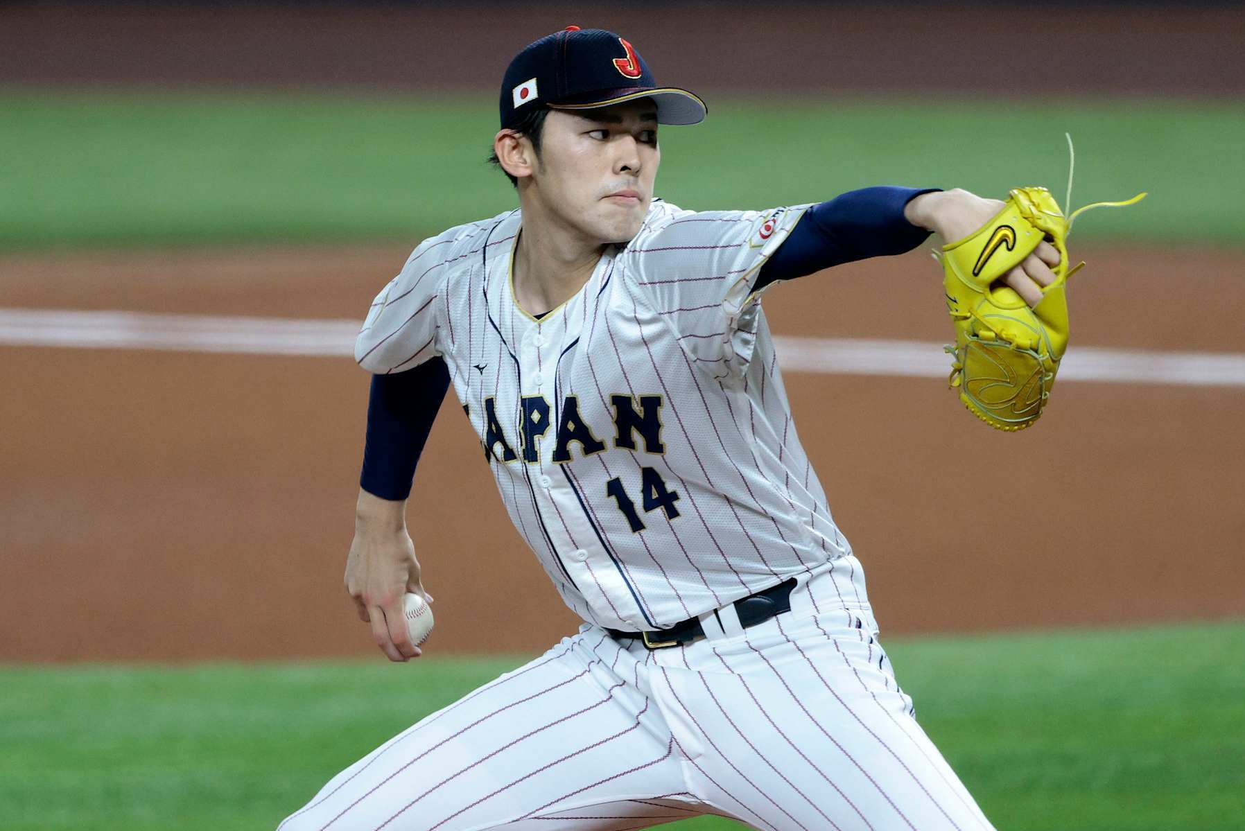 MIAMI, FL - MARCH 20: Roki Sasaki #14 of Team Japan pitches during the 2023 World Baseball Classic Semifinal game against Team Mexico at loanDepot Park on March 20, 2023 in Miami, Florida. (Photo by Christopher Pasatieri/Getty Images)