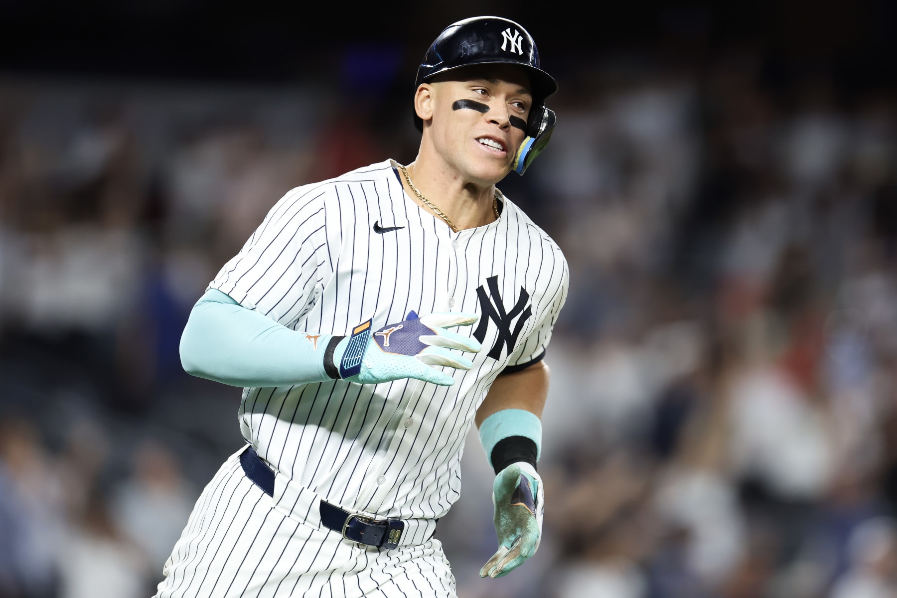 NEW YORK, NEW YORK - JULY 02: Aaron Judge #99 of the New York Yankees celebrates his solo home run on the base paths against the Cincinnati Reds in the seventh inning at Yankee Stadium on July 02, 2024 in the Bronx borough of New York City. (Photo by Luke Hales/Getty Images)