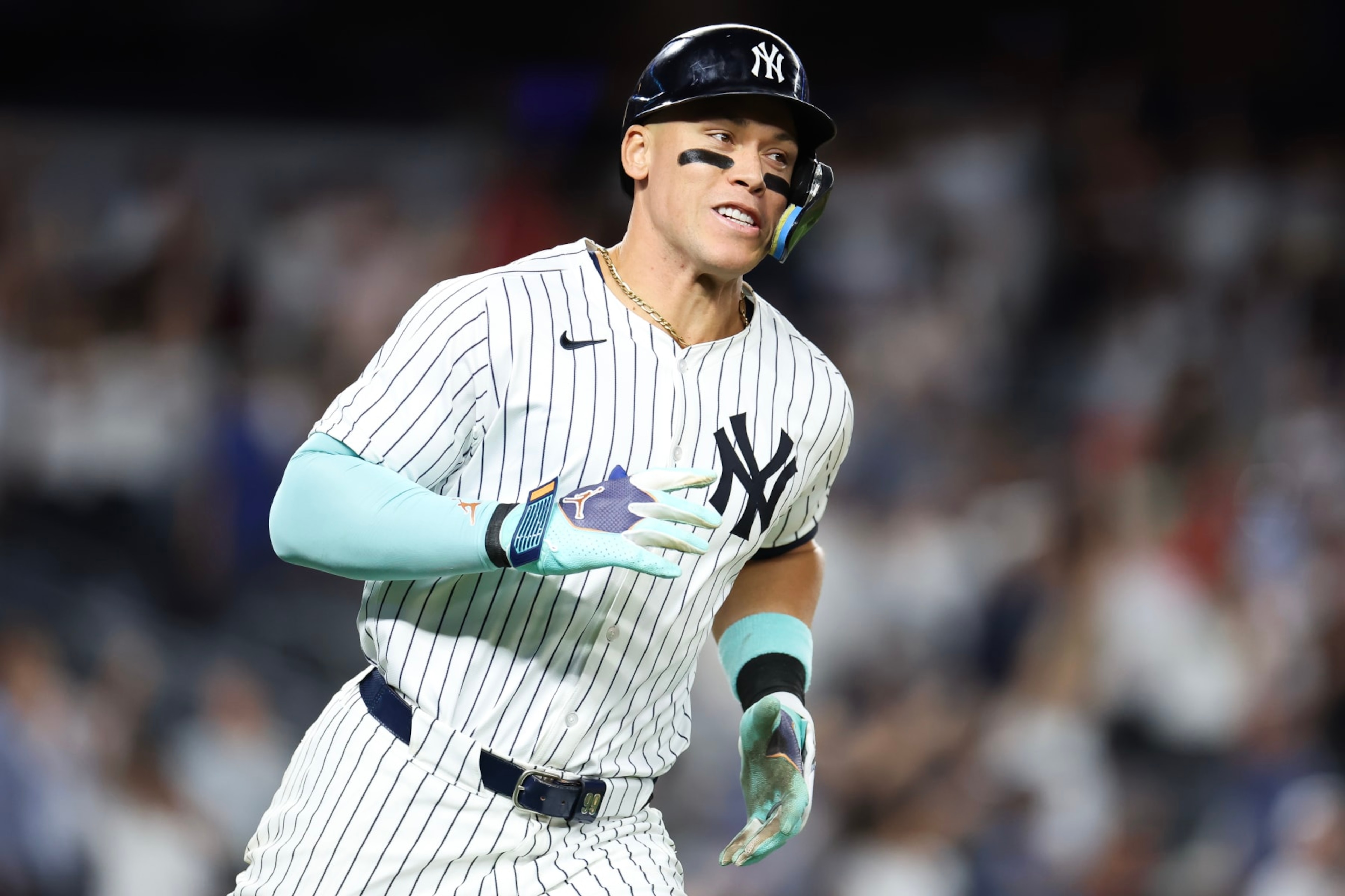 NEW YORK, NEW YORK - JULY 02: Aaron Judge #99 of the New York Yankees celebrates his solo home run on the base paths against the Cincinnati Reds in the seventh inning at Yankee Stadium on July 02, 2024 in the Bronx borough of New York City. (Photo by Luke Hales/Getty Images)