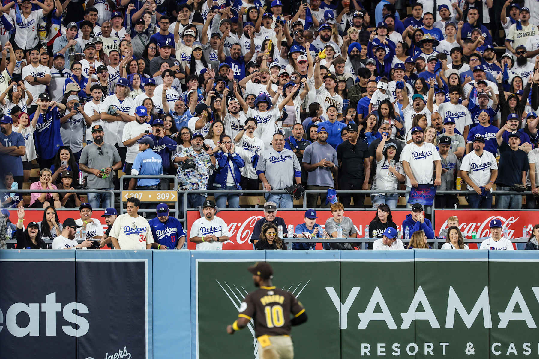 Los Angeles, CA, Sunday, October 6, 2024 - Padrews left fielder Jurickson Profar suffers the derision of fans in the bleachers in game two of the National League Division Series at Dodger Stadium. (Robert Gauthier/Los Angeles Times via Getty Images)