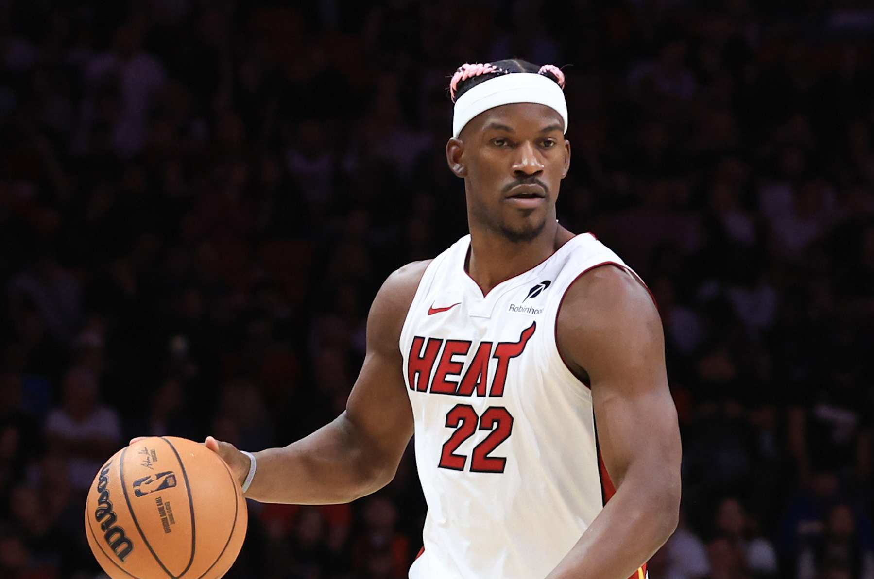MIAMI, FLORIDA - JANUARY 01: Jimmy Butler #22 of the Miami Heat dribbles the ball against the New Orleans Pelicans during the second quarter at Kaseya Center on January 01, 2025 in Miami, Florida. NOTE TO USER: User expressly acknowledges and agrees that, by downloading and or using this photograph, User is consenting to the terms and conditions of the Getty Images License Agreement. (Photo by Megan Briggs/Getty Images)