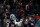 COLUMBUS, OH - APRIL 13: Elvis Merzlikins #90 of the Columbus Blue Jackets is congratulated by Jack Roslovic #96 after defeating the Montreal Canadiens at Nationwide Arena on April 13, 2022 in Columbus, Ohio. Columbus defeated Montreal 5-1. (Photo by Kirk Irwin/Getty Images)