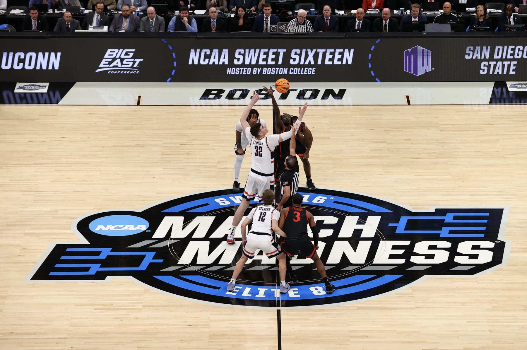 BOSTON, MASSACHUSETTS - MARCH 28: Donovan Clingan #32 of the Connecticut Huskies and Jay Pal #4 of the San Diego State Aztecs jump for the ball during the Sweet Sixteen round of the 2024 NCAA Men's Basketball Tournament held at TD Garden on March 28, 2024 in Boston, Massachusetts. (Photo by Jamie Schwaberow/NCAA Photos via Getty Images)