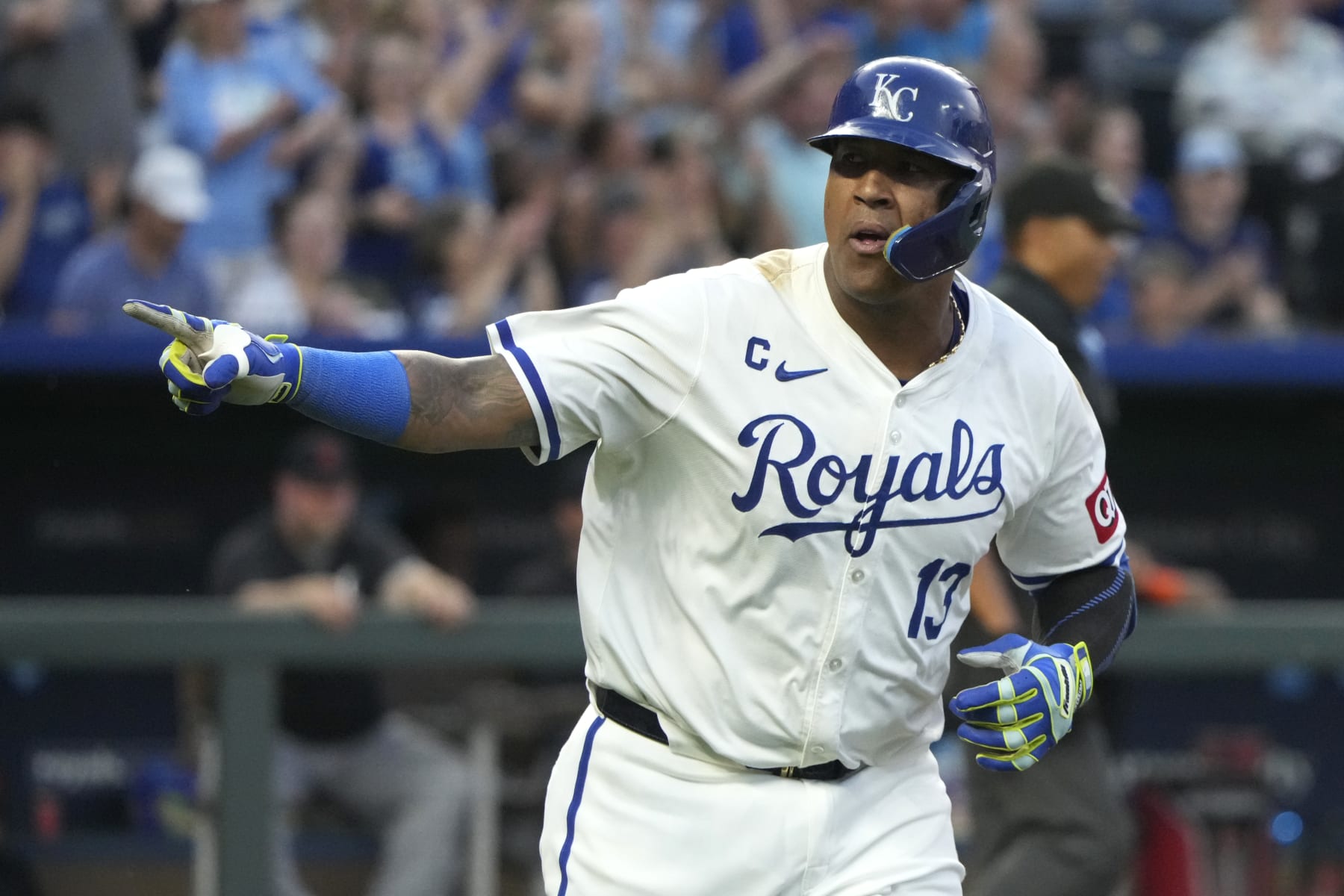 KANSAS CITY, MISSOURI - MAY 20: Salvador Perez #13 of the Kansas City Royals points to teammates as he celebrates his home run in the sixth inning against the Detroit Tigers at Kauffman Stadium on May 20, 2024 in Kansas City, Missouri. (Photo by Ed Zurga/Getty Images)