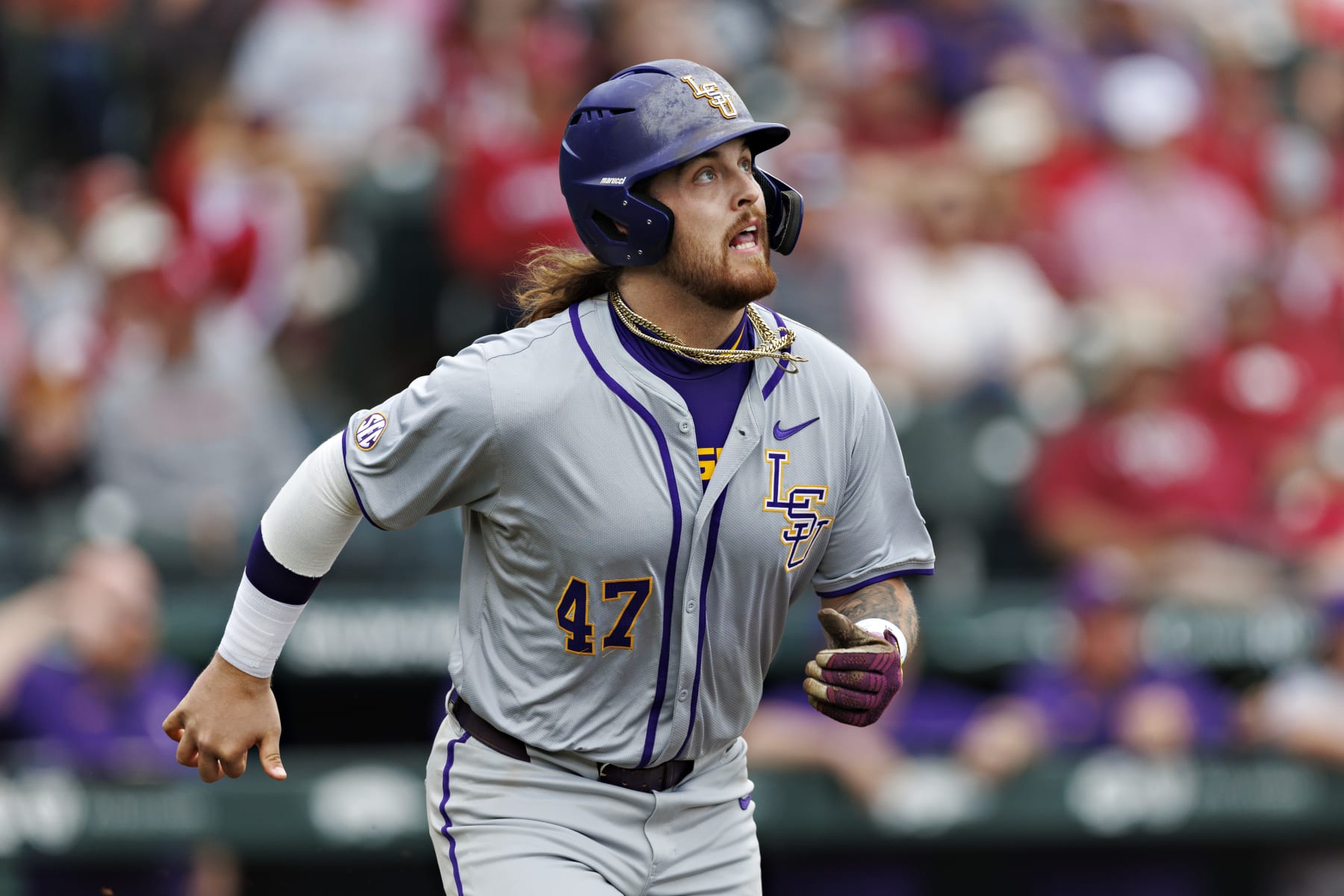 FAYETTEVILLE, ARKANSAS - MARCH 30: Tommy White #47 of the LSU Tigers watches his home run on the way to first base during the game against the Arkansas Razorbacks at Baum-Walker Stadium at George Cole Field on March 30, 2024 in Fayetteville, Arkansas.  The Razorbacks defeated the Tigers 7-5.  (Photo by Wesley Hitt/Getty Images)