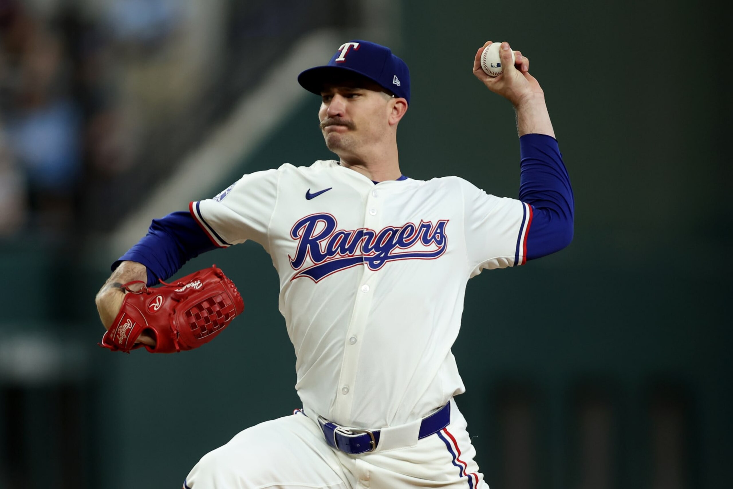 ARLINGTON, TEXAS - JULY 06: Andrew Heaney #44 of the Texas Rangers throws a pitch in the third inning against the Tampa Bay Rays at Globe Life Field on July 06, 2024 in Arlington, Texas. (Photo by Tim Heitman/Getty Images)
