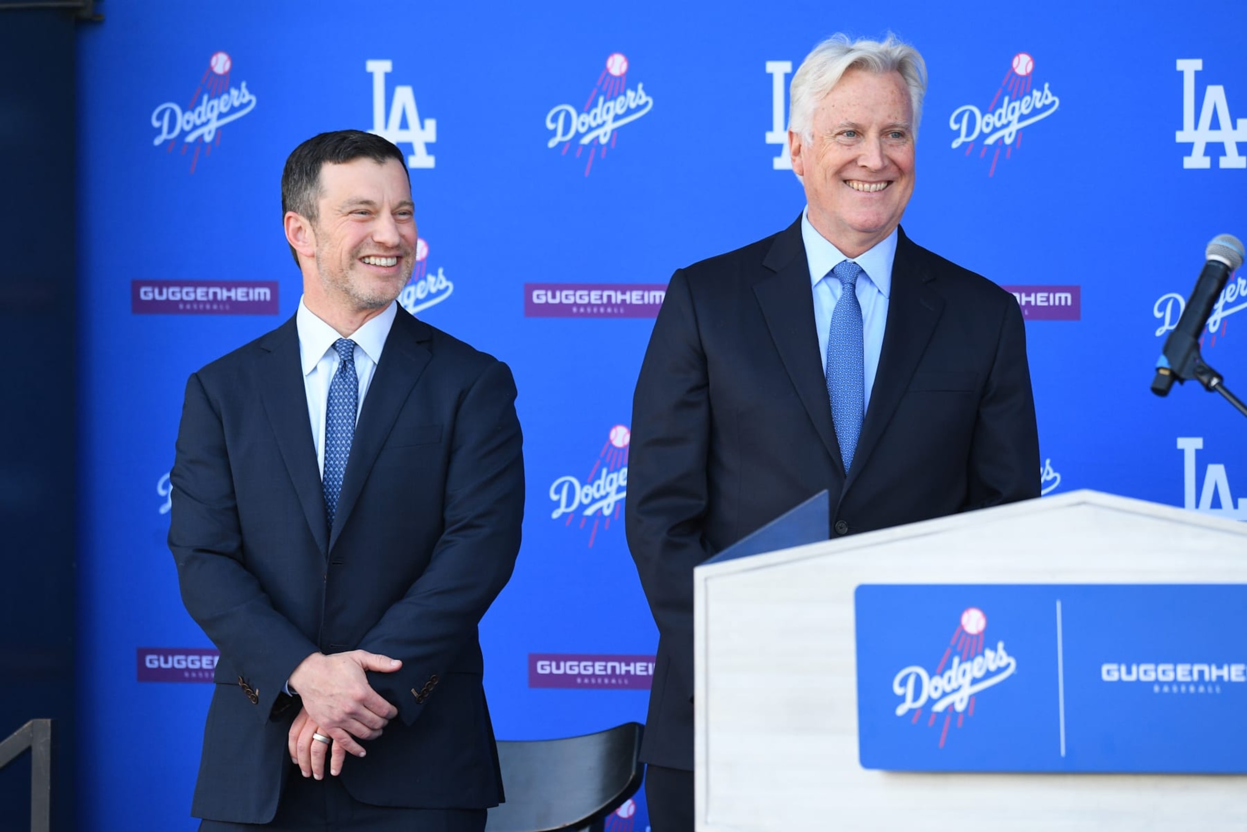 LOS ANGELES, CA - DECEMBER 14: Chairman of the Los Angeles Dodgers Mark Walter and President of Baseball Operations Andrew Friedman look on during Shohei Ohtani's introduction at a press conference on December 14, 2023 at Dodger Stadium in Los Angeles, CA. (Photo by Brian Rothmuller/Icon Sportswire via Getty Images)