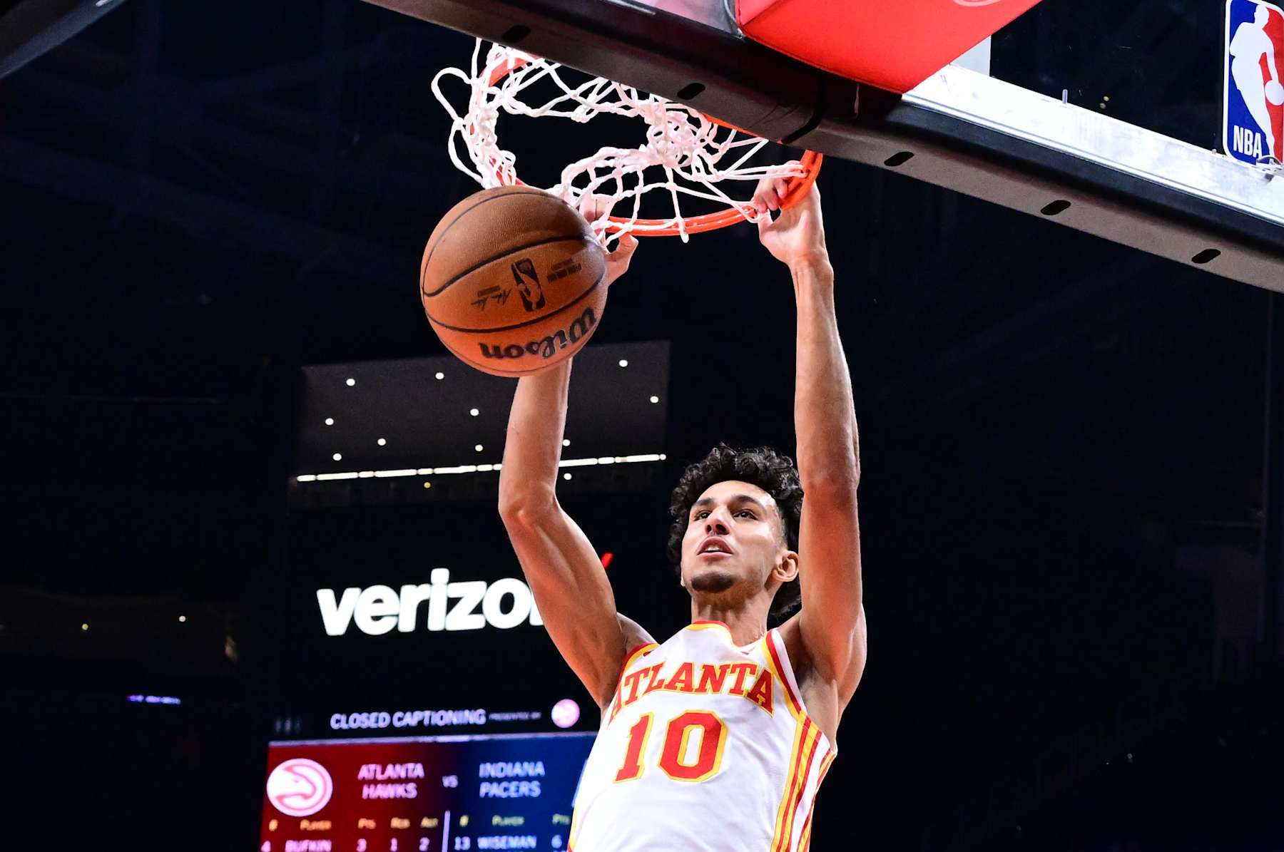 ATLANTA, GA - OCTOBER 8: Zaccharie Risacher #10 of the Atlanta Hawks dunks the ball during the game against the Indiana Pacers during a NBA preseason game on October 8, 2024 at State Farm Arena in Atlanta, Georgia.  NOTE TO USER: User expressly acknowledges and agrees that, by downloading and/or using this Photograph, user is consenting to the terms and conditions of the Getty Images License Agreement. Mandatory Copyright Notice: Copyright 2024 NBAE (Photo by Adam Hagy/NBAE via Getty Images)