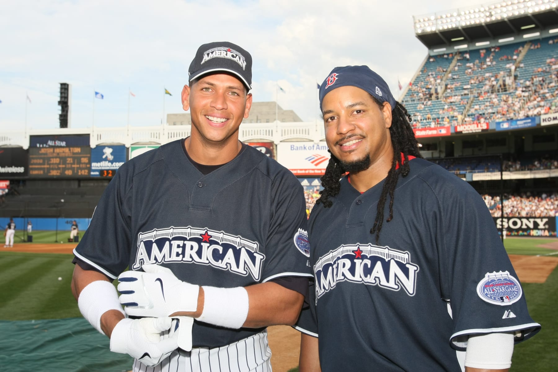 BRONX, NY - JULY 14: Alex Rodriguez #13 of the New York Yankees poses with Manny Ramirez #24 of the Boston Red Sox before the State Farm Home Run Derby at the Yankee Stadium in the Bronx, New York on July 14, 2008. (Photo by Rich Pilling/MLB via Getty Images)