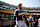 OAKLAND, CALIFORNIA - AUGUST 25: Jackson Chourio #11 of the Milwaukee Brewers prepares in the dugout before the game against the Oakland Athletics at Oakland Coliseum on August 25, 2024 in Oakland, California. (Photo by Lachlan Cunningham/Getty Images)