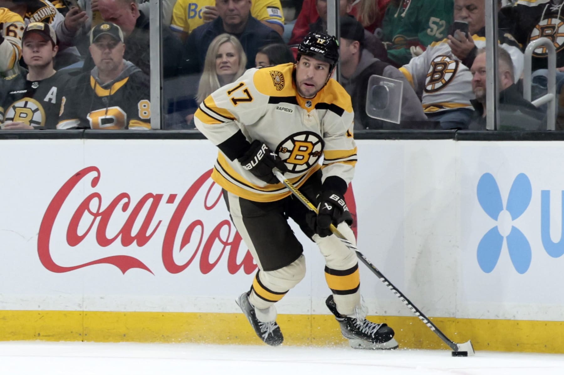 BOSTON, MA - OCTOBER 11: Boston Bruins left wing Milan Lucic (17) looks up ice during a game between the Boston Bruins and the Chicago Blackhawks on October 11, 2023, at TD Garden in Boston, Massachusetts. (Photo by Fred Kfoury III/Icon Sportswire via Getty Images)