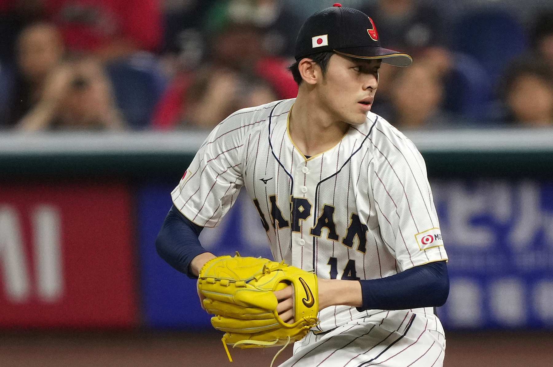 MIAMI, FL - MARCH 20: Roki Sasaki #14 of Japan delivers a pitch in the first inning against Mexico at loanDepot park on March 20, 2023 in Miami, Florida. (Photo by Jasen Vinlove/Miami Marlins/Getty Images)