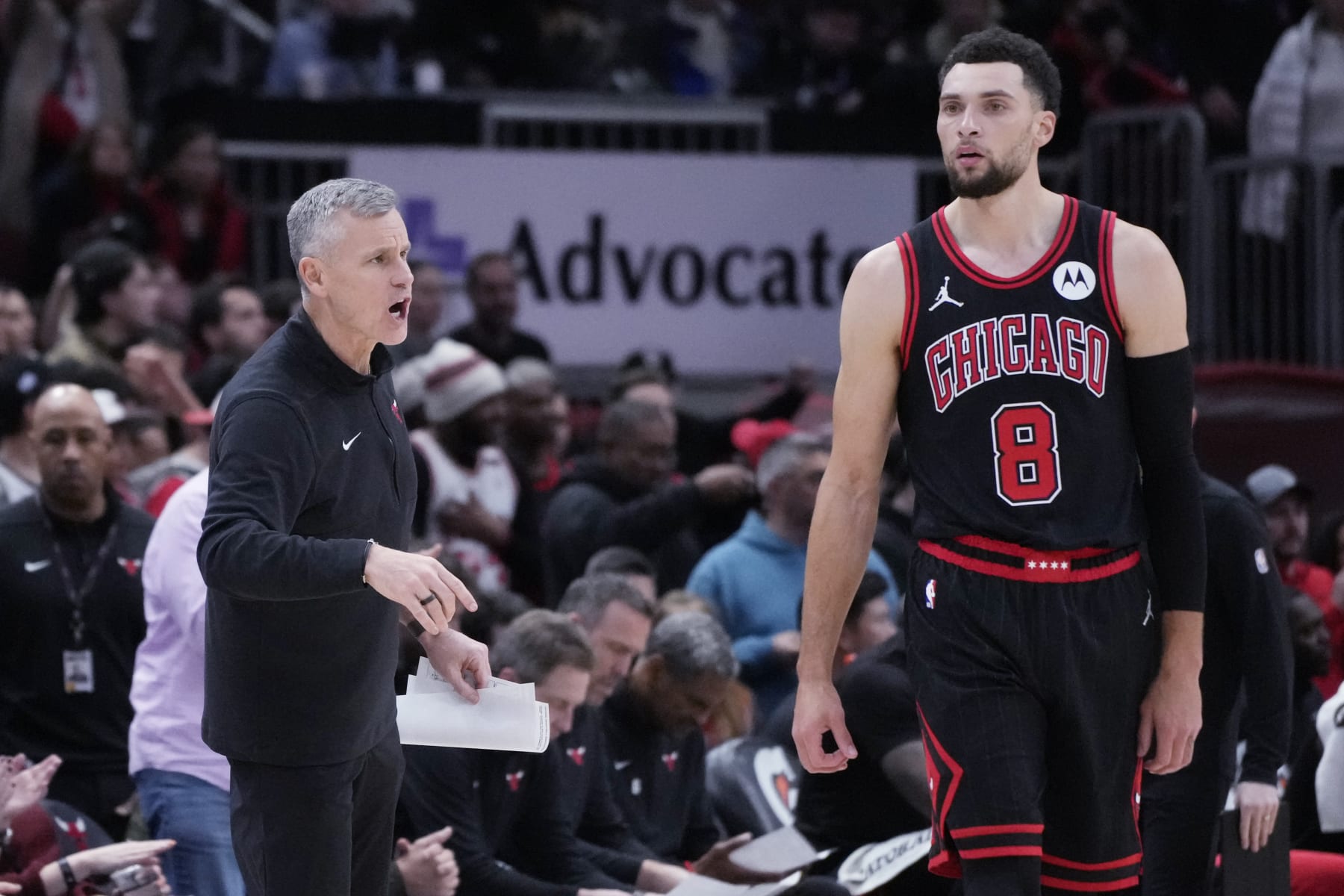 Chicago Bulls head coach Billy Donovan, left, talks to guard Zach LaVine (8) during the second half of an NBA basketball game against the Miami Heat in Chicago, Saturday, Nov. 18, 2023. (AP Photo/Nam Y. Huh)