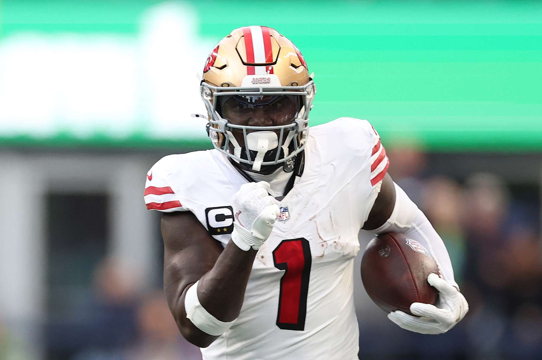 SEATTLE, WASHINGTON - OCTOBER 10: Deebo Samuel Sr. #1 of the San Francisco 49ers carries the ball against the Seattle Seahawks at Lumen Field on October 10, 2024 in Seattle, Washington. (Photo by Steph Chambers/Getty Images)