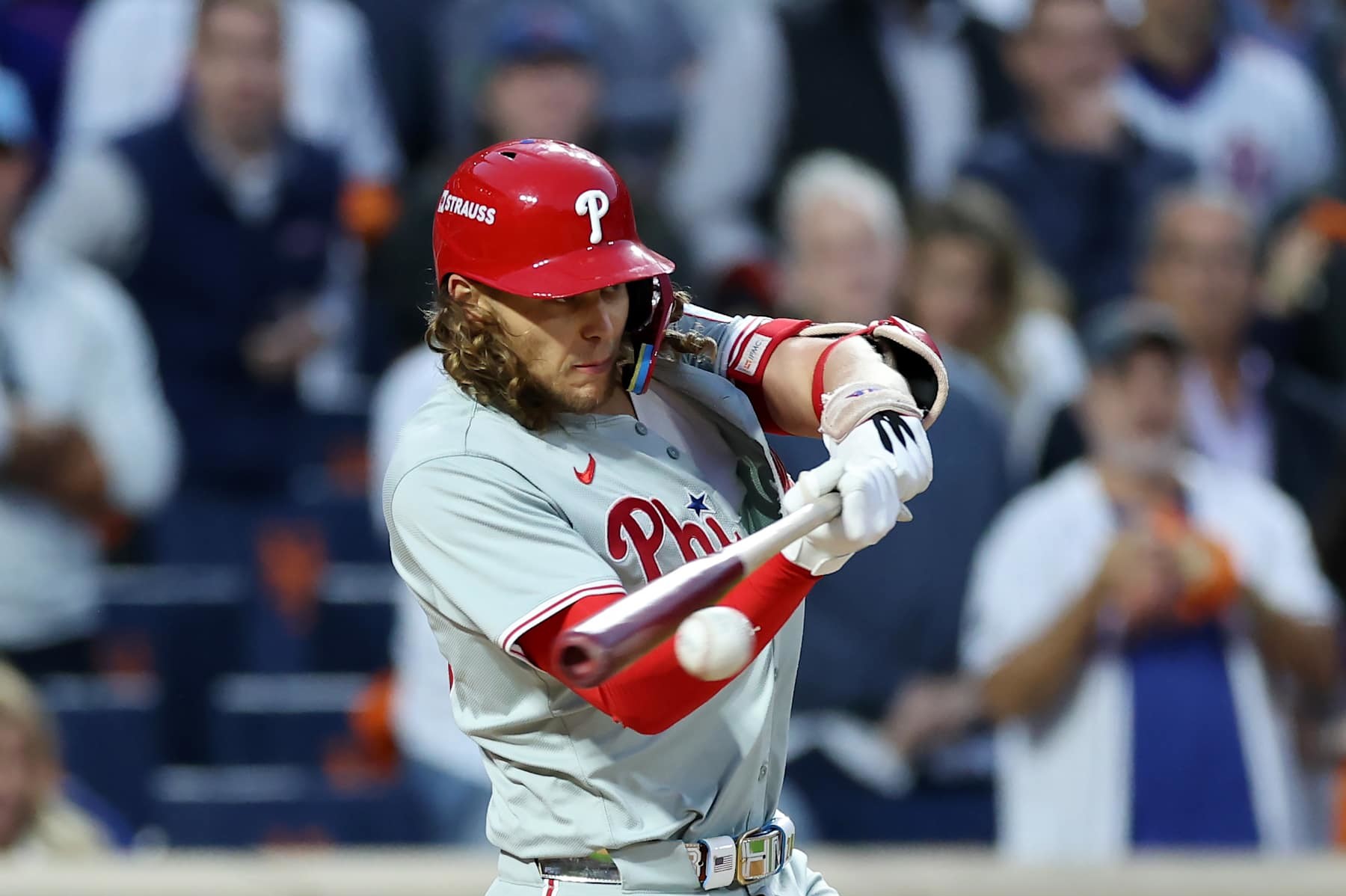 NEW YORK, NEW YORK - OCTOBER 09: Alec Bohm #28 of the Philadelphia Phillies reaches on a fielder's choice in the fourth inning against the New York Mets during Game Four of the Division Series at Citi Field on October 09, 2024 in New York City. (Photo by Luke Hales/Getty Images)