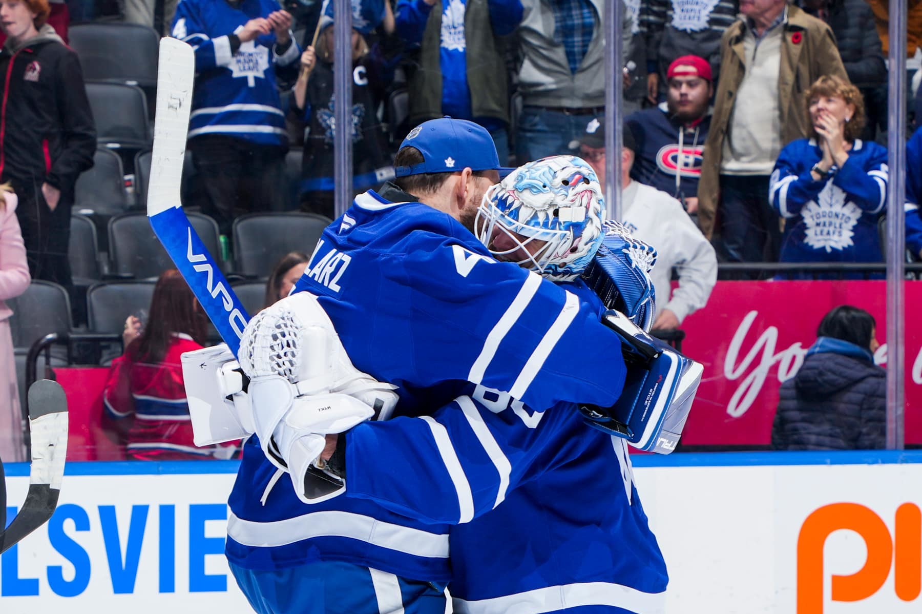 TORONTO, ON - NOVEMBER 9: Anthony Stolarz #41 of the Toronto Maple Leafs hugs teammate Joseph Woll #60 after defeating the Montreal Canadiens at Scotiabank Arena on November 9, 2024 in Toronto, Ontario, Canada. (Photo by Mark Blinch/NHLI via Getty Images)