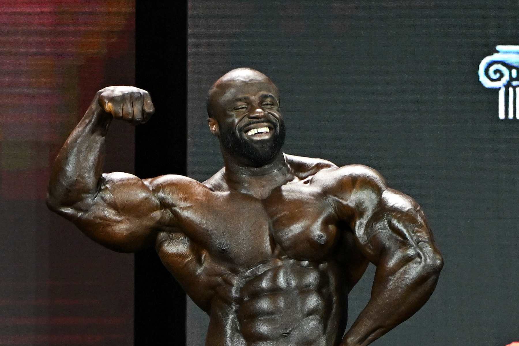 LAS VEGAS, NEVADA - DECEMBER 17, 2022: Samson Dauda competes in the Mr. Olympia event during the Olympia Fitness & Performance weekend at Planet Hollywood Resort and Casino on December 17, 2022 in Las Vegas, Nevada. (Photo by Chris Bernacchi/Diamond Images via Getty Images)
