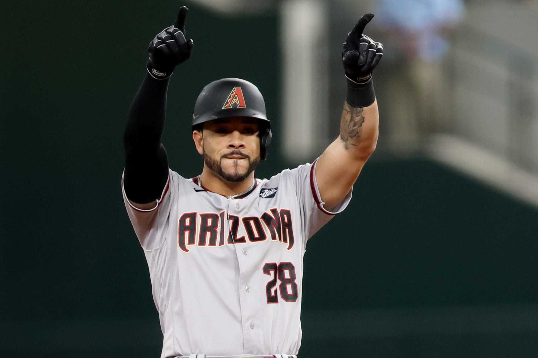 ARLINGTON, TX - OCTOBER 28: Tommy Pham #28 of the Arizona Diamondbacks celebrates after hitting a double win the fourth inning during Game 2 of the 2023 World Series between the Arizona Diamondbacks and the Texas Rangers at Globe Life Field on Saturday, October 28, 2023 in Arlington, Texas. (Photo by Rob Tringali/MLB Photos via Getty Images)