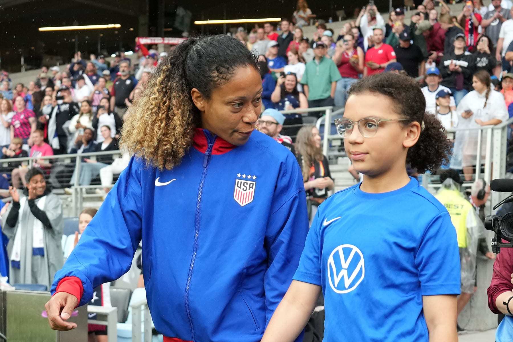 ST PAUL, MINNESOTA - JUNE 04: Casey Krueger #20 of the United States enters the field for pre-game ceremonies prior to playing the Korea Republic at Allianz Field on June 04, 2024 in St Paul, Minnesota. (Photo by Brad Smith/ISI Photos/USSF/Getty Images)