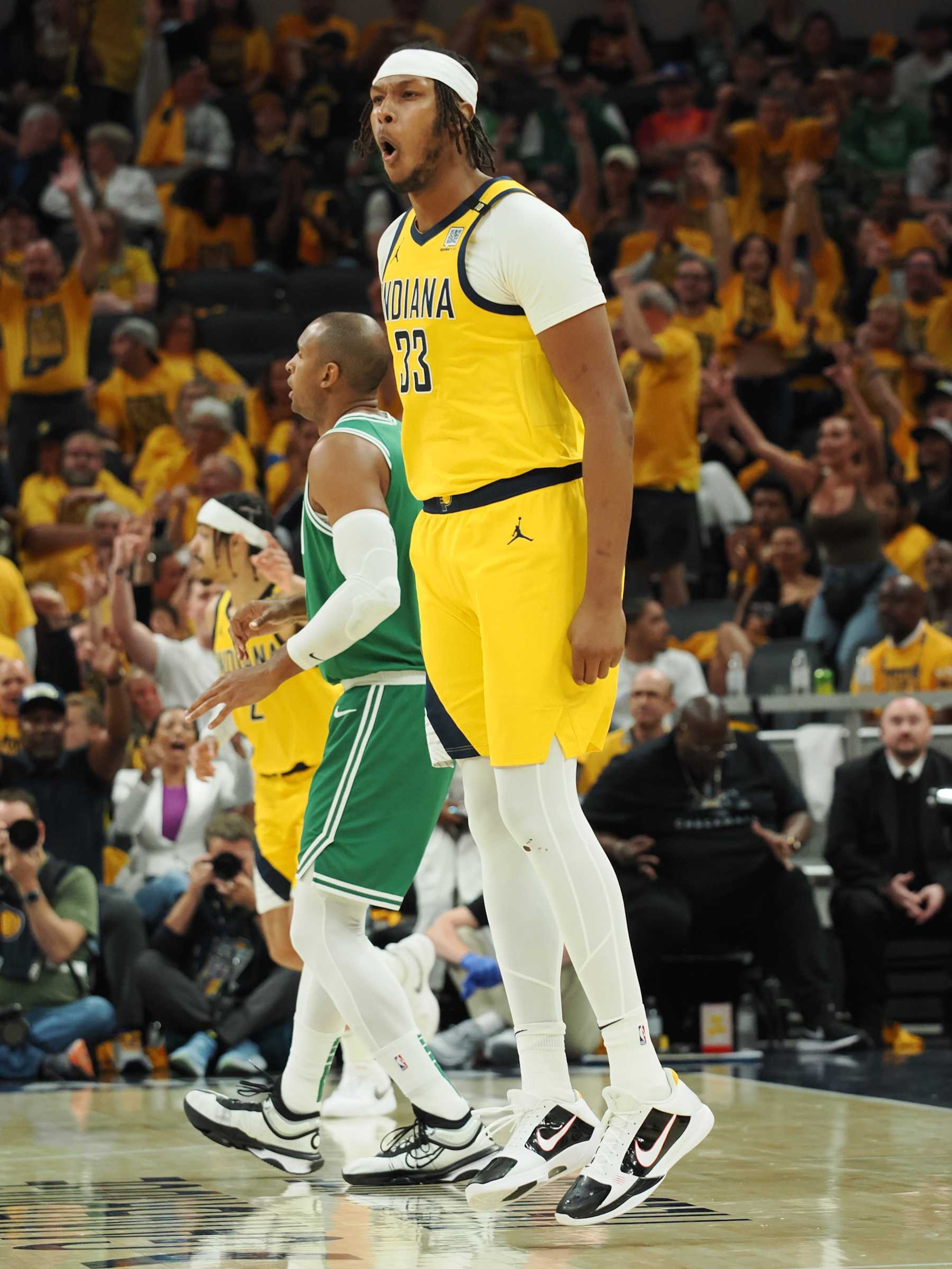 INDIANAPOLIS, IN - MAY 27: Myles Turner #33 of the Indiana Pacers celebrates during the game against the Boston Celtics during Game 4 of the Eastern Conference Finals of the 2024 NBA Playoffs on May 27, 2024 at Gainbridge Fieldhouse in Indianapolis, Indiana. NOTE TO USER: User expressly acknowledges and agrees that, by downloading and or using this Photograph, user is consenting to the terms and conditions of the Getty Images License Agreement. Mandatory Copyright Notice: Copyright 2024 NBAE (Photo by Ron Hoskins/NBAE via Getty Images)